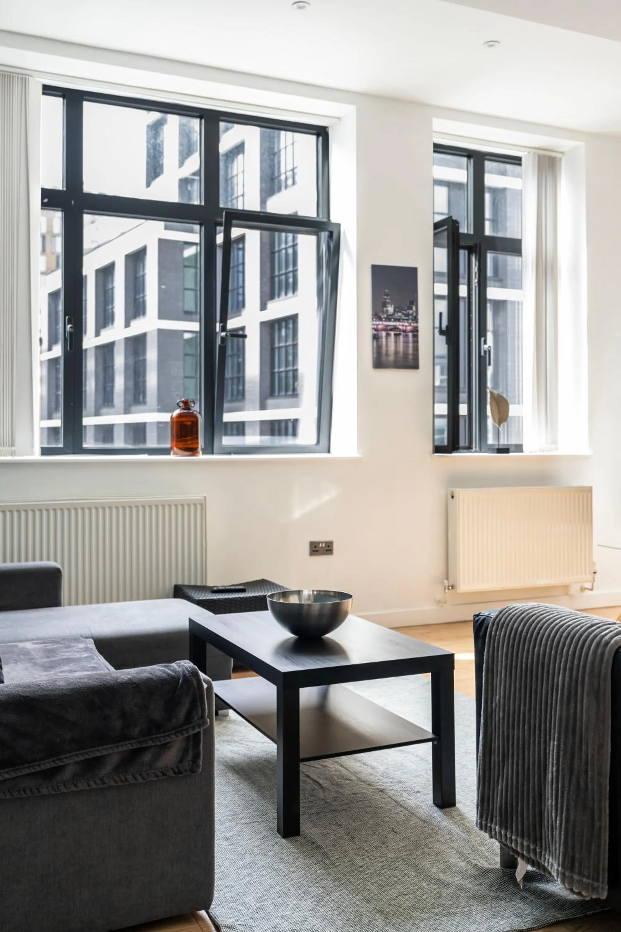 Living room in Shoreditch Apartments by PrimeCityHosts