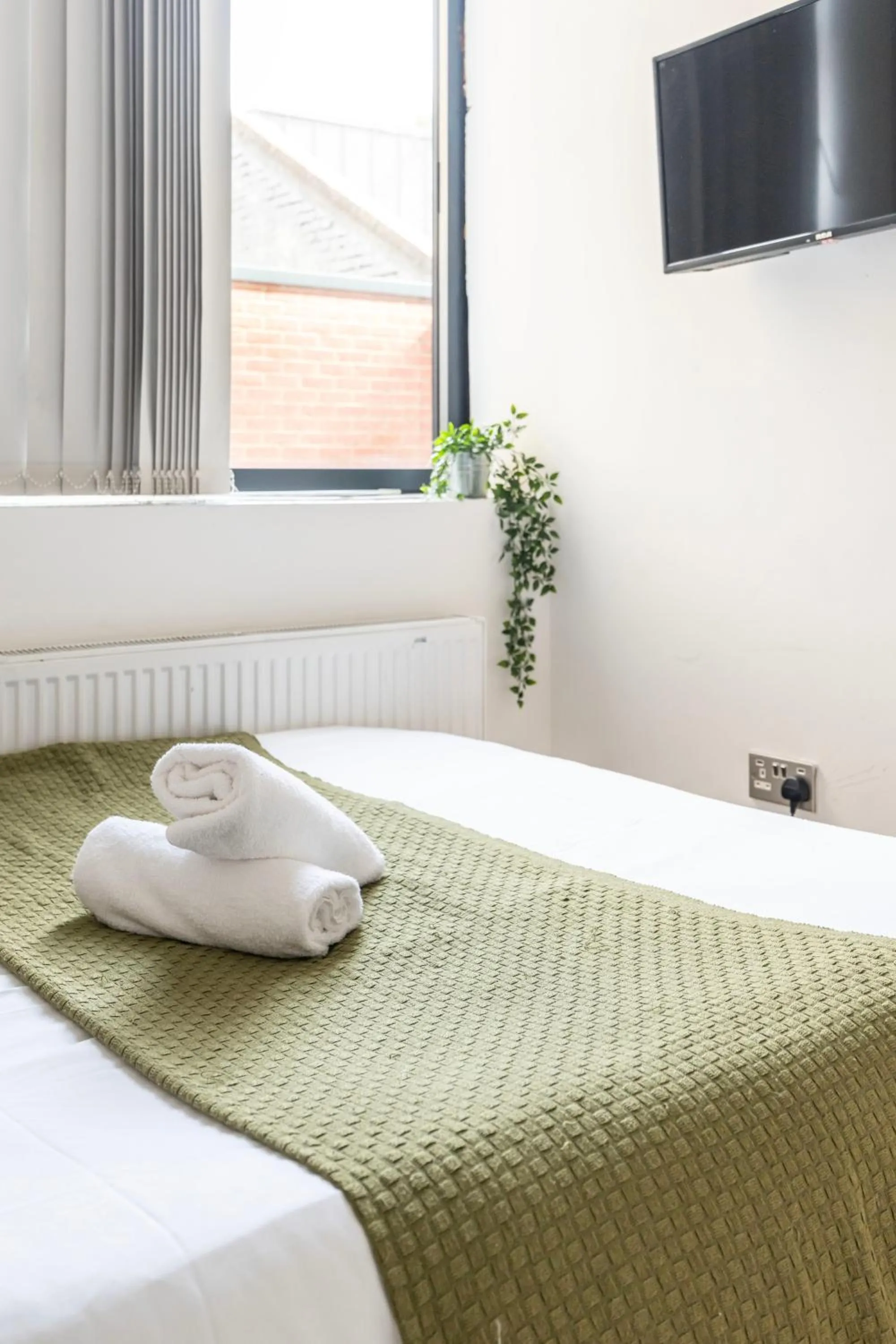 Bed in Shoreditch Apartments by PrimeCityHosts