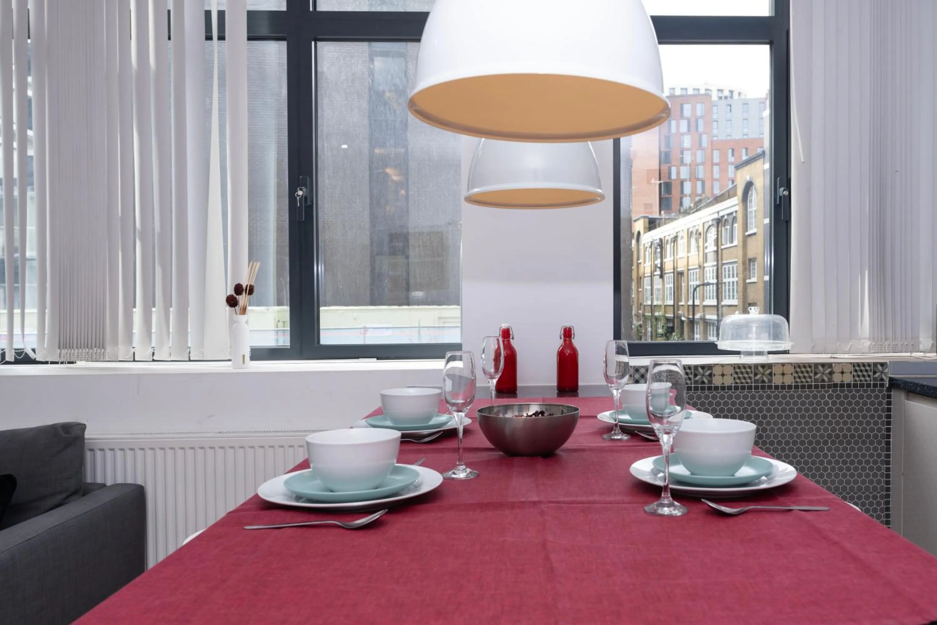 Dining area in Shoreditch Apartments by PrimeCityHosts