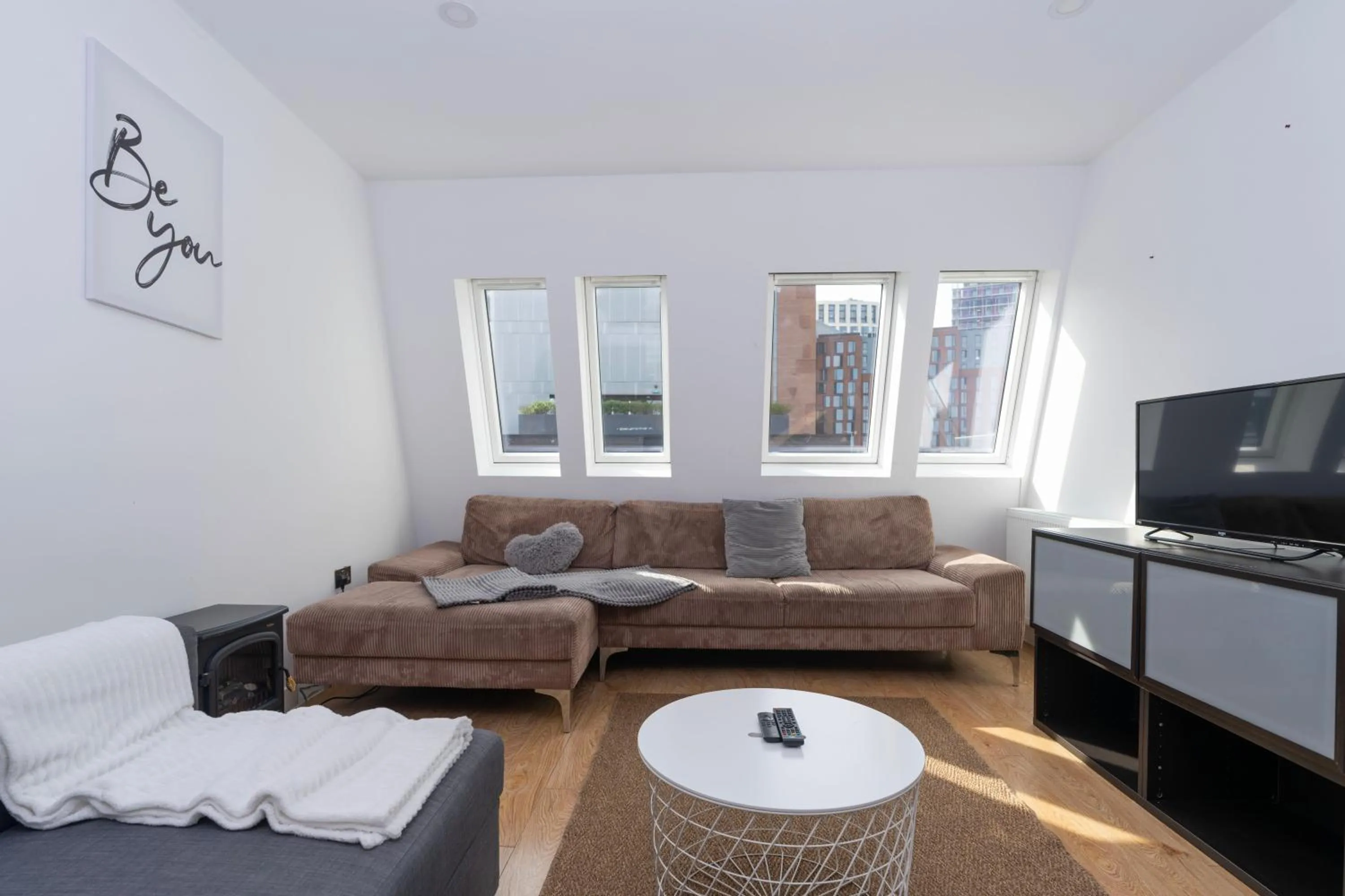 Living room in Shoreditch Apartments by PrimeCityHosts