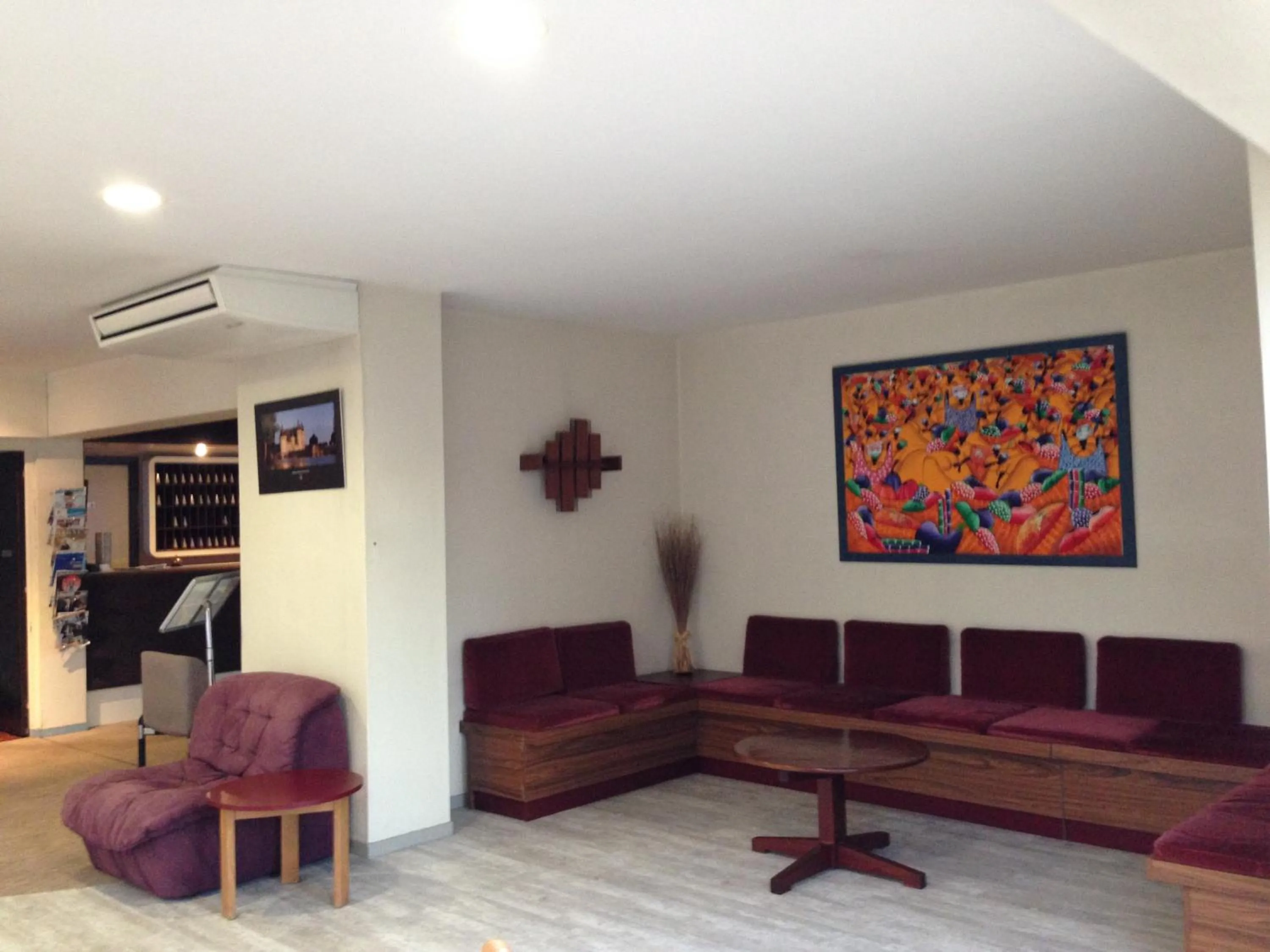 Communal lounge/ TV room, Seating Area in Promotel