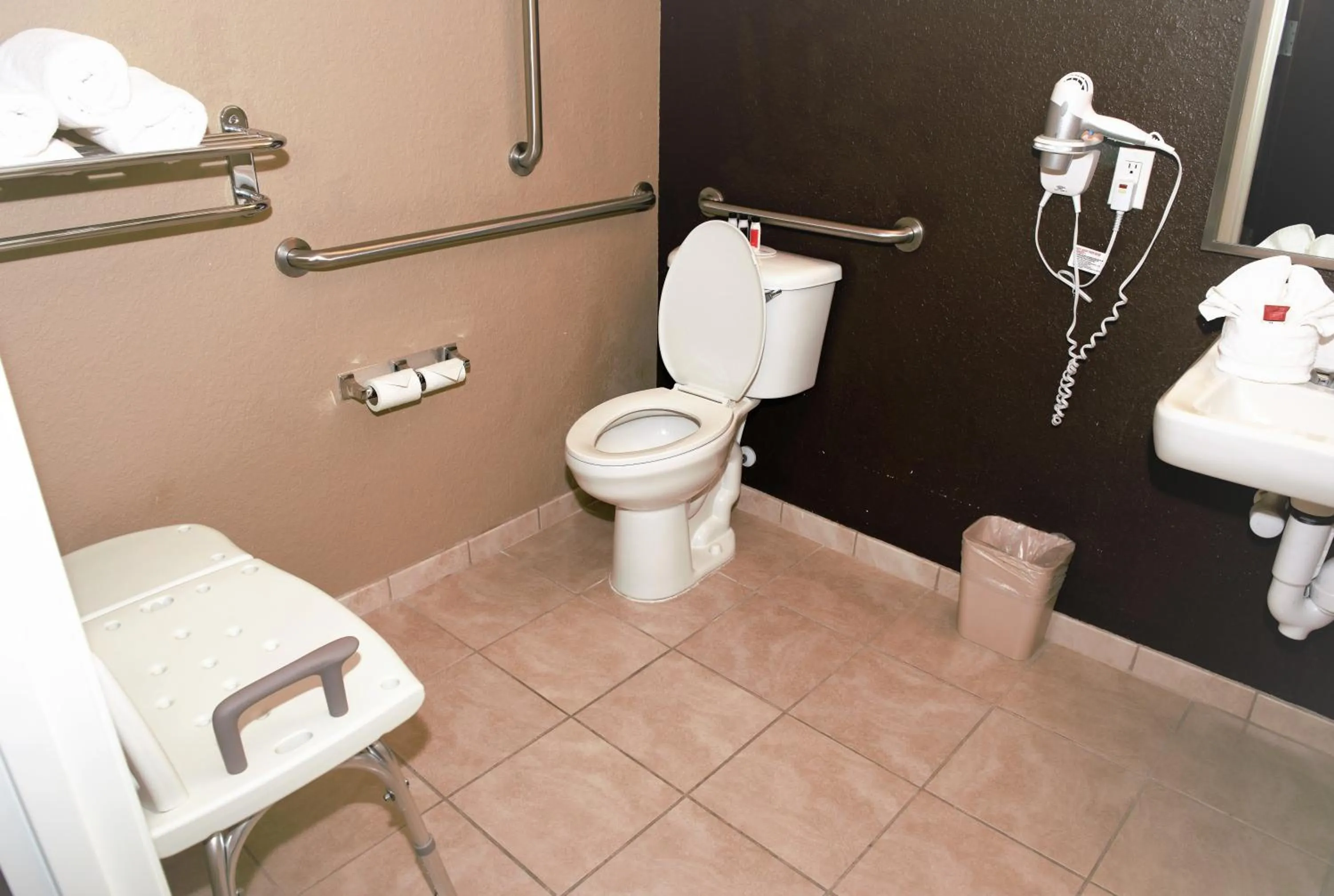 Toilet in Microtel Inn & Suites by Wyndham Jacksonville Airport
