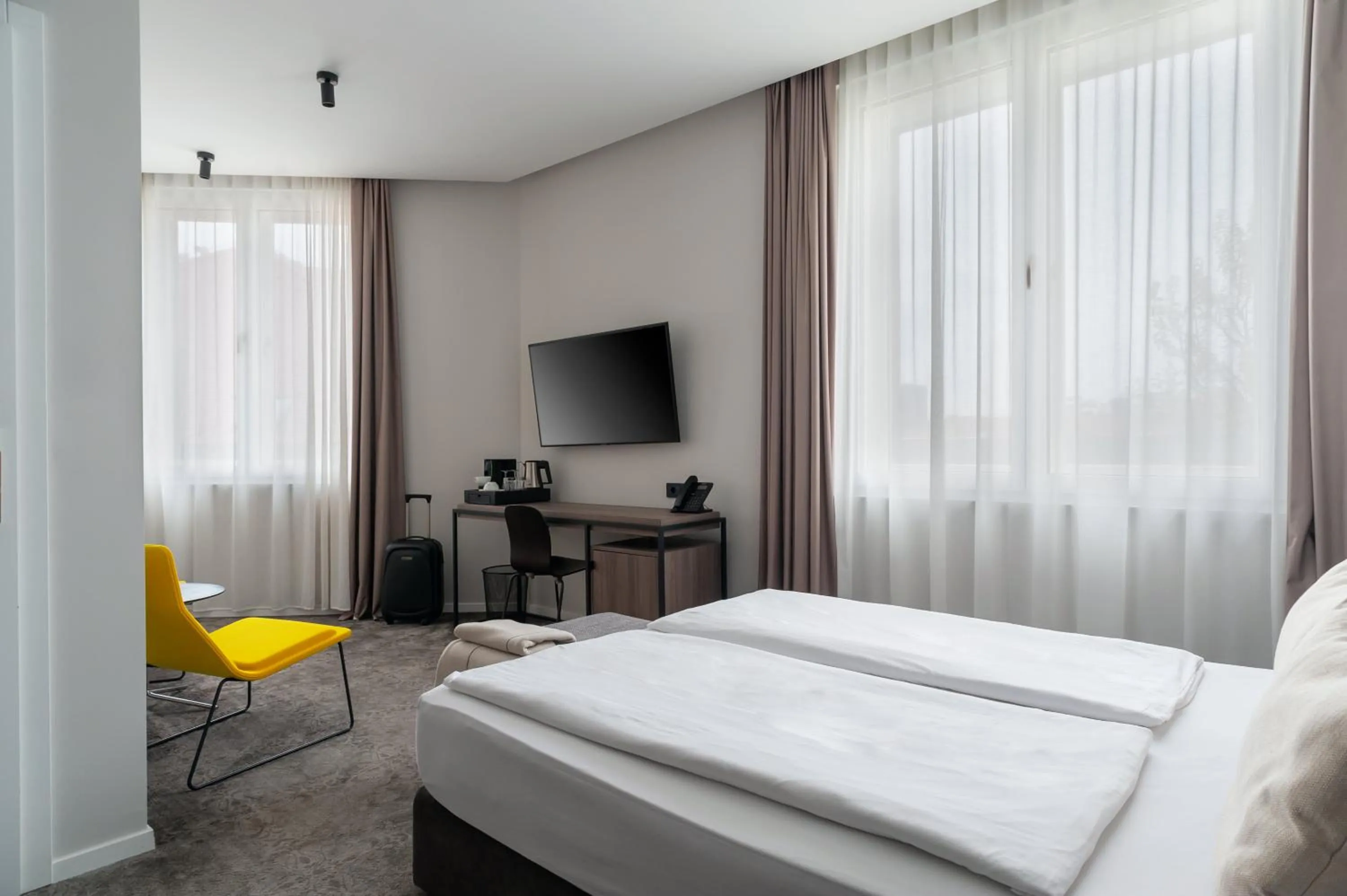 Bed in MANDA Heritage Hotel