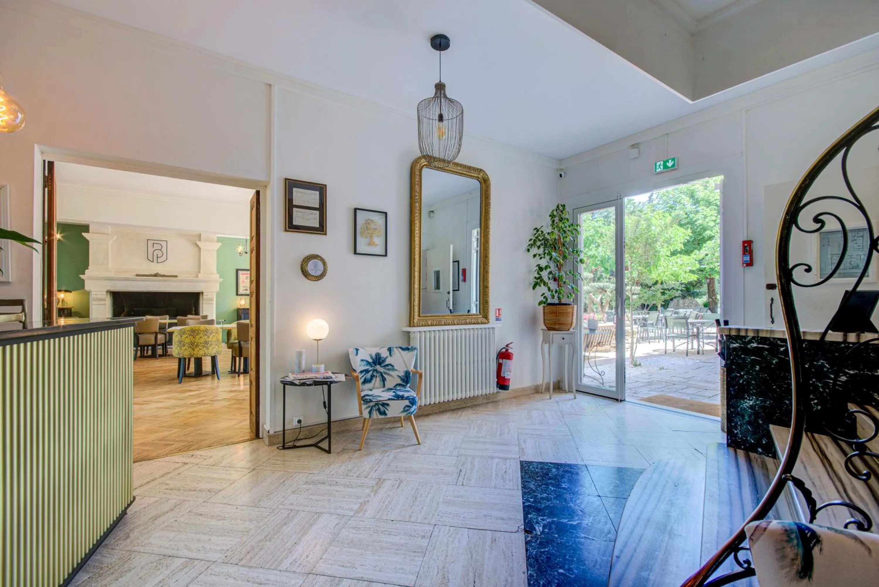 Lobby or reception in Logis Hotel Le Blason de Provence