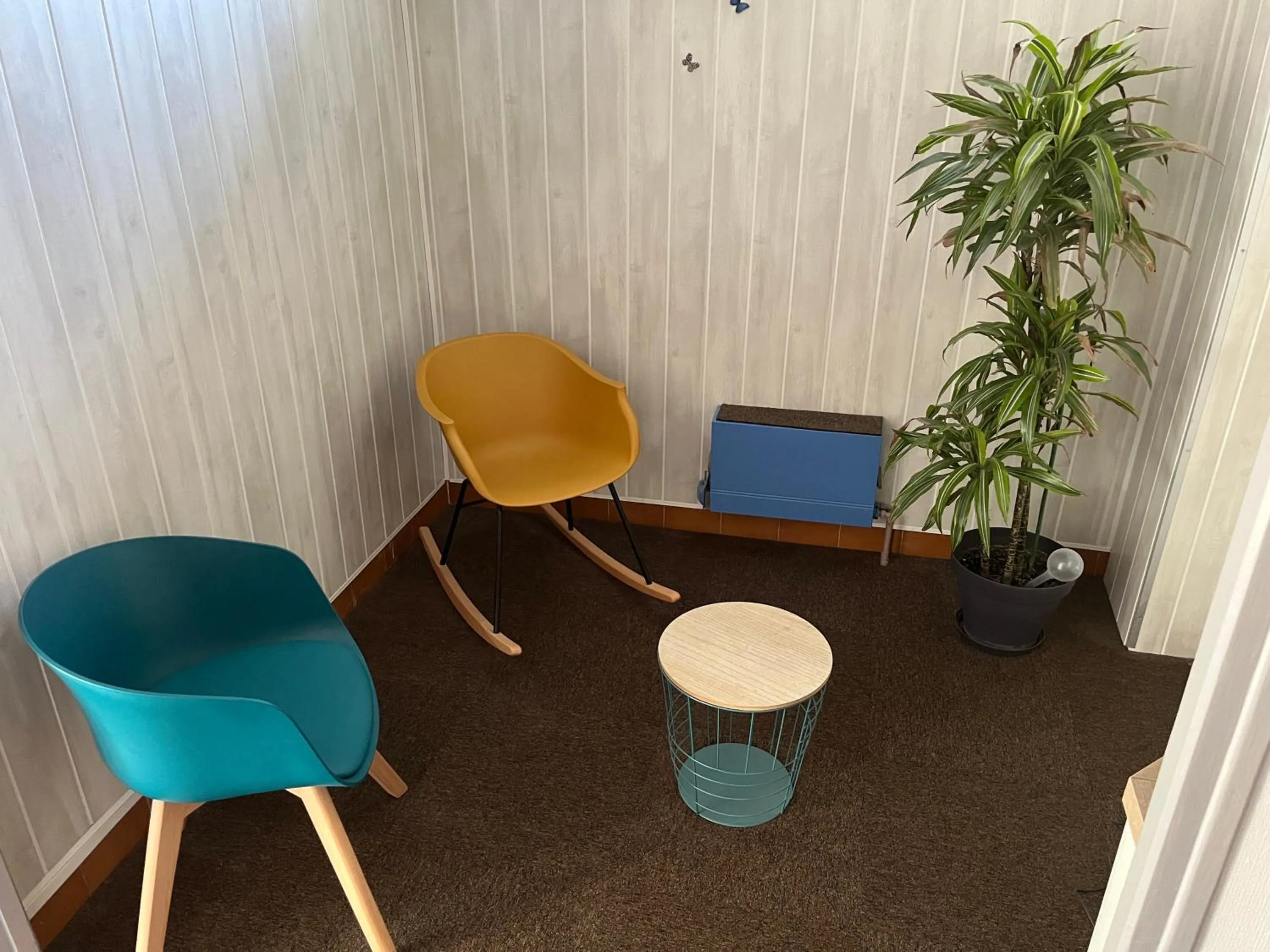 Seating area in Hôtel Le Lyon Vert Commentry