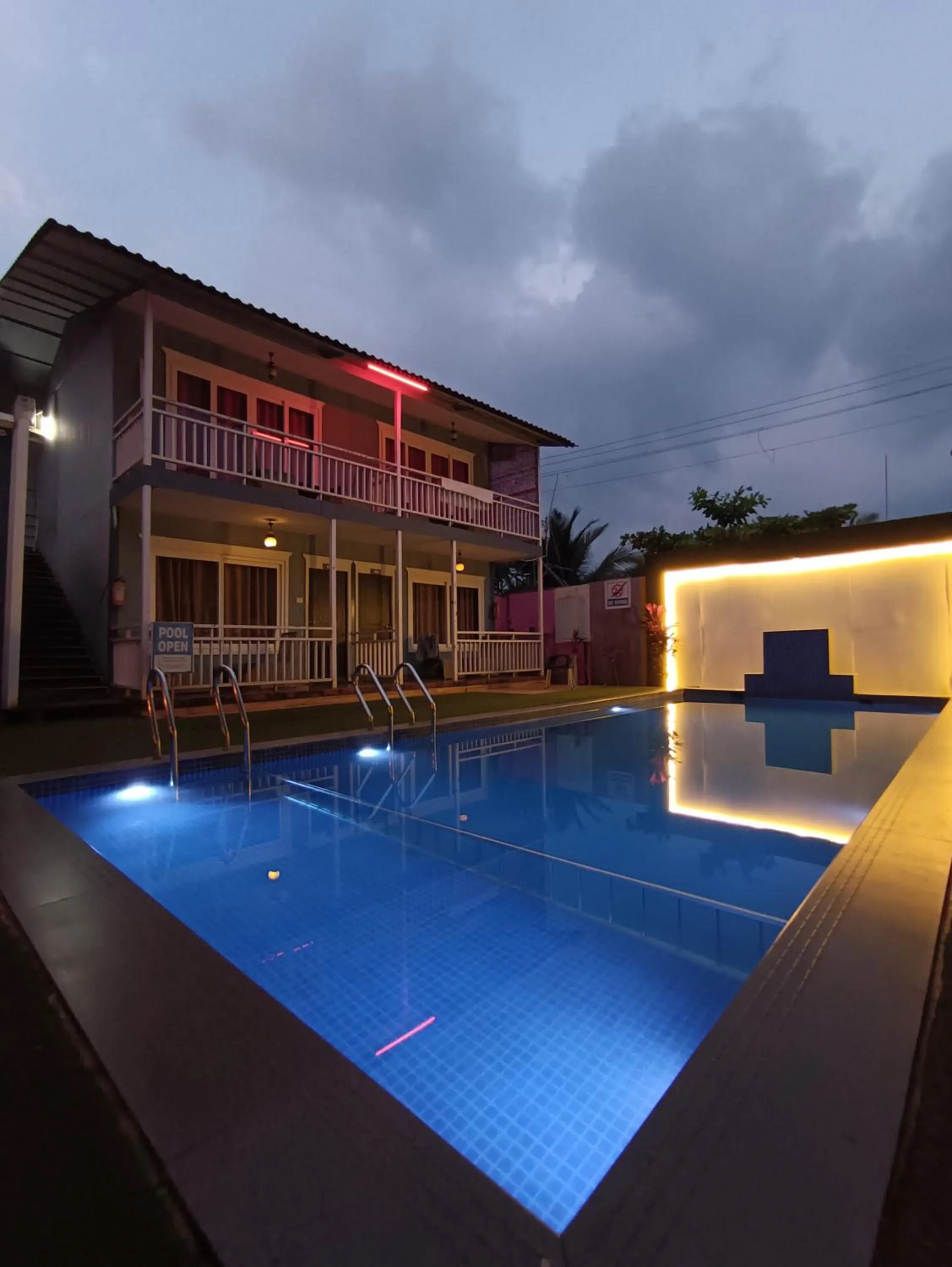 Swimming pool in Sea Shell Beach Cottages & Suites