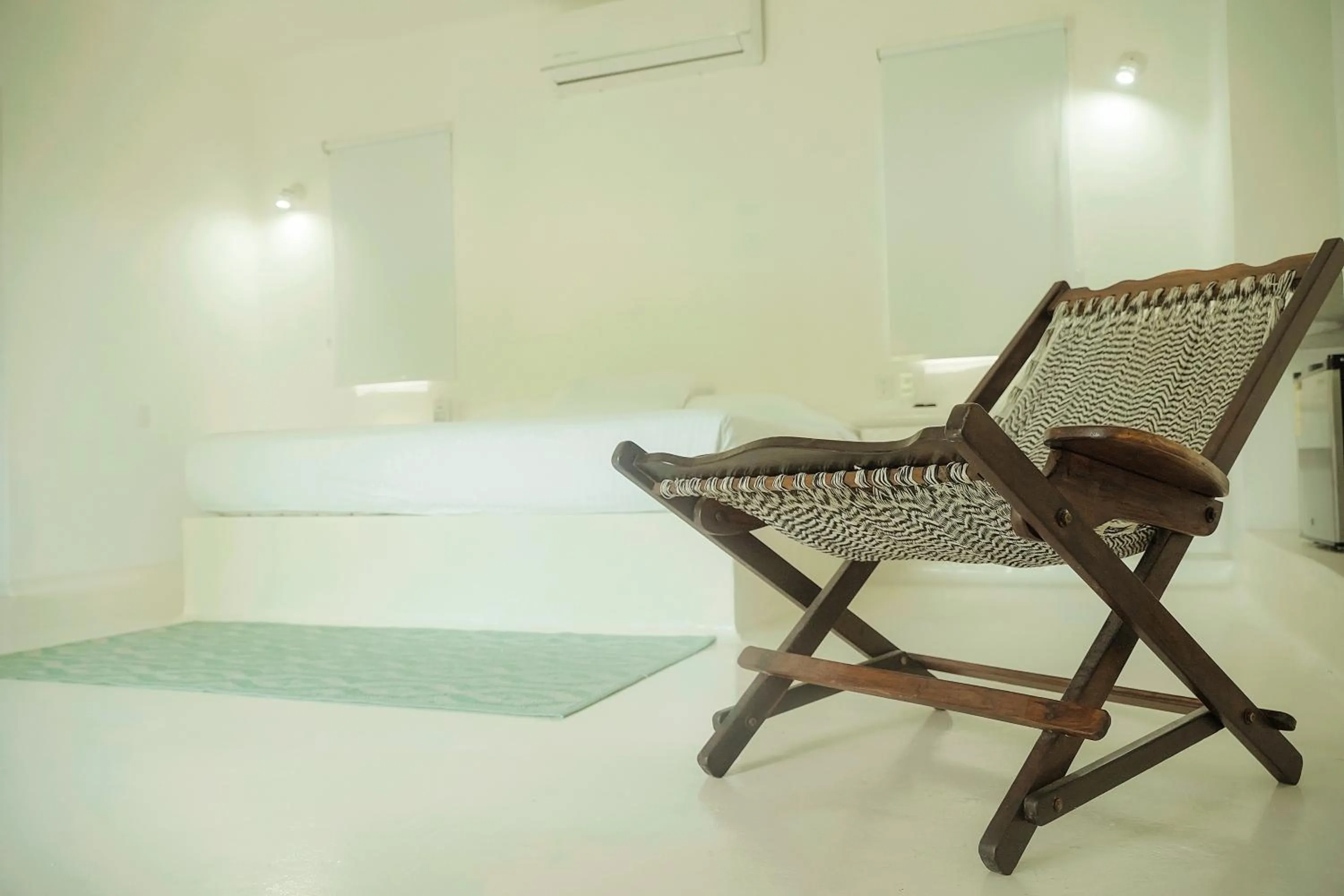 Bed in Royal Palm Bacalar Cabañas & Lagoon Club