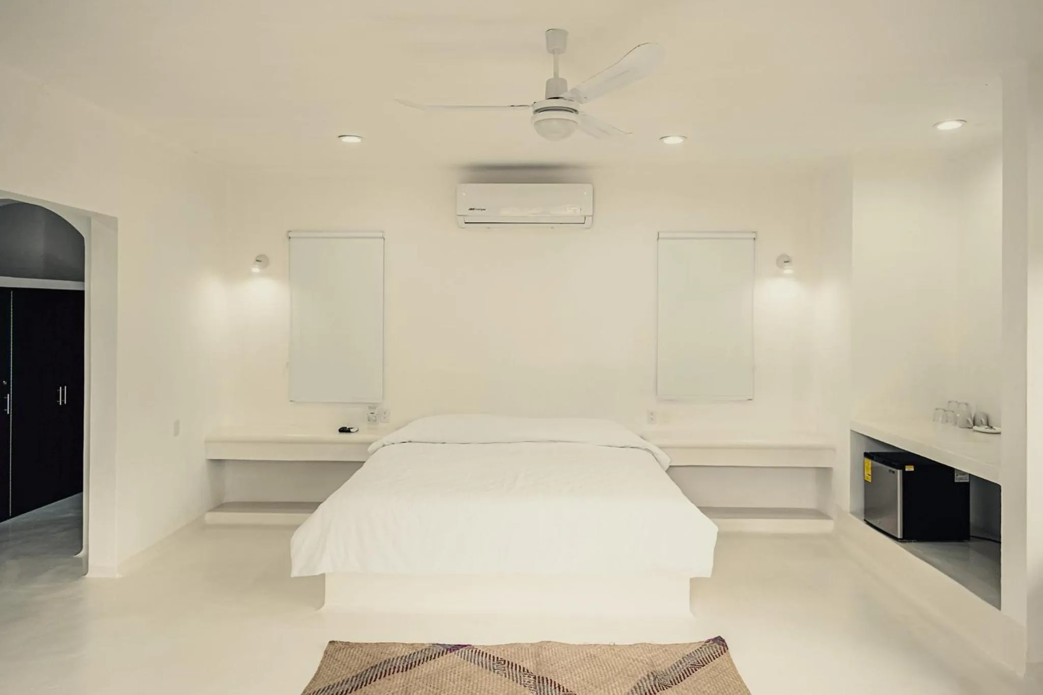 Bed in Royal Palm Bacalar Cabañas & Lagoon Club