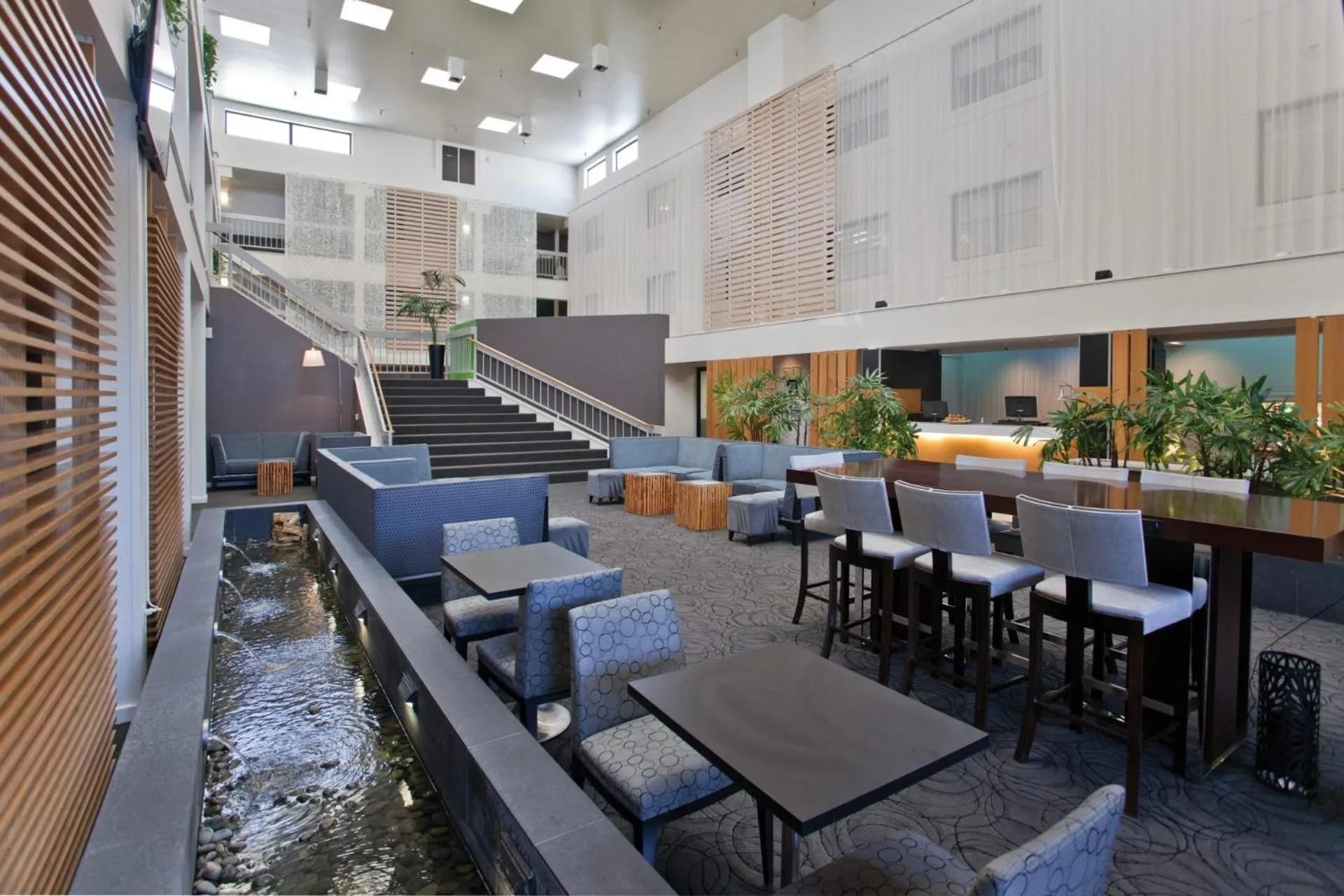 Communal lounge/ TV room in The Domain Hotel