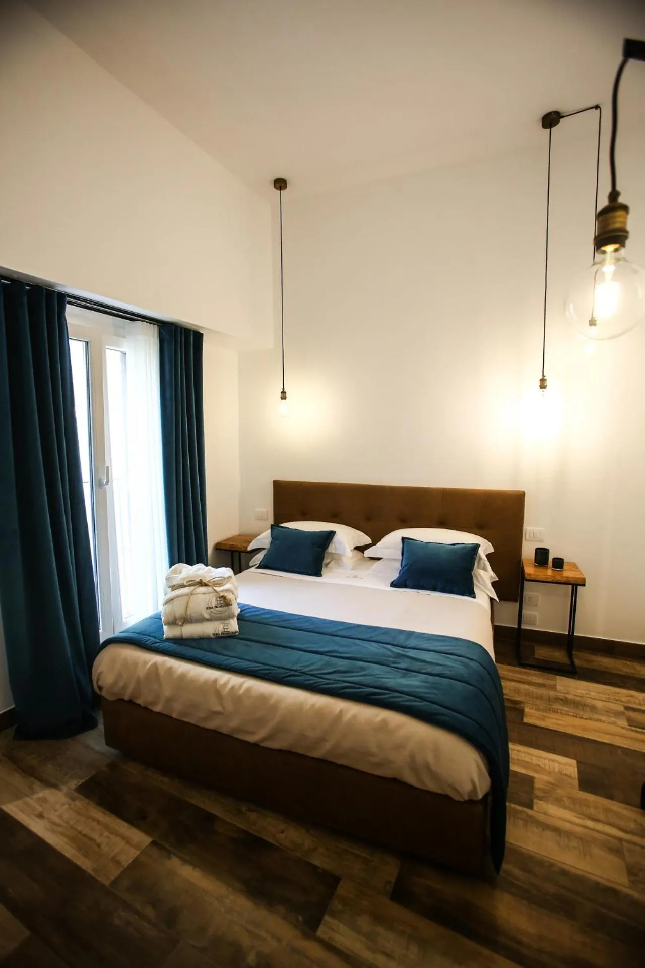 Bed in Luna Federiciana Luxury Room & Spa