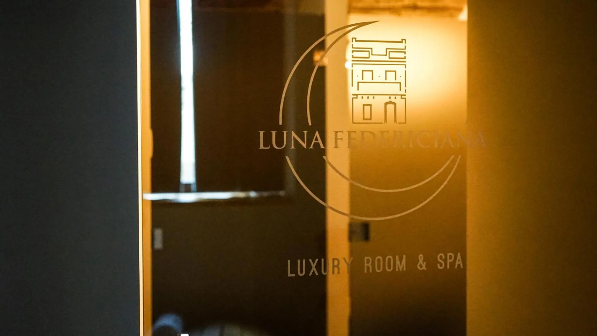 Property logo or sign in Luna Federiciana Luxury Room & Spa