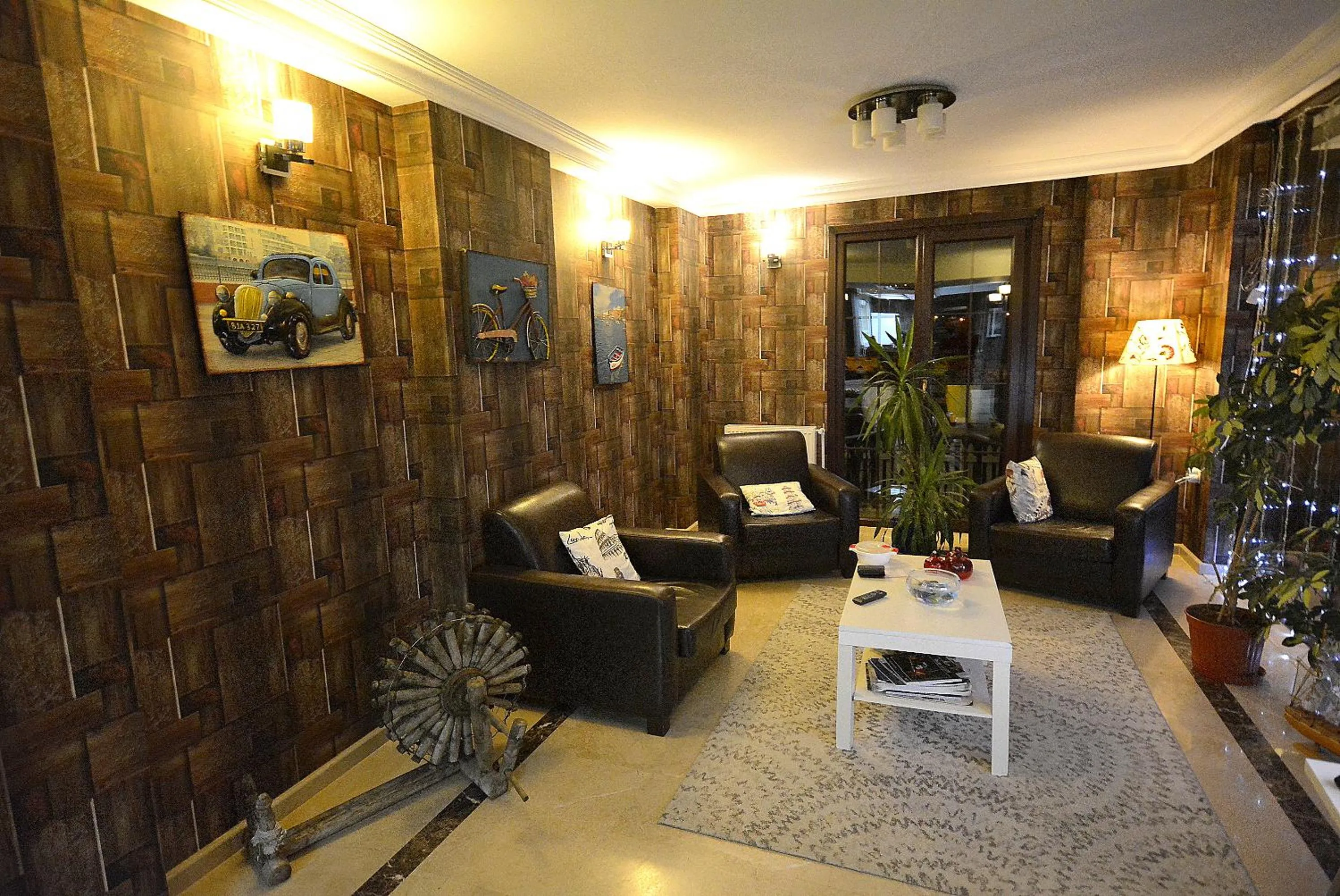 Communal lounge/ TV room in Velena Hotel