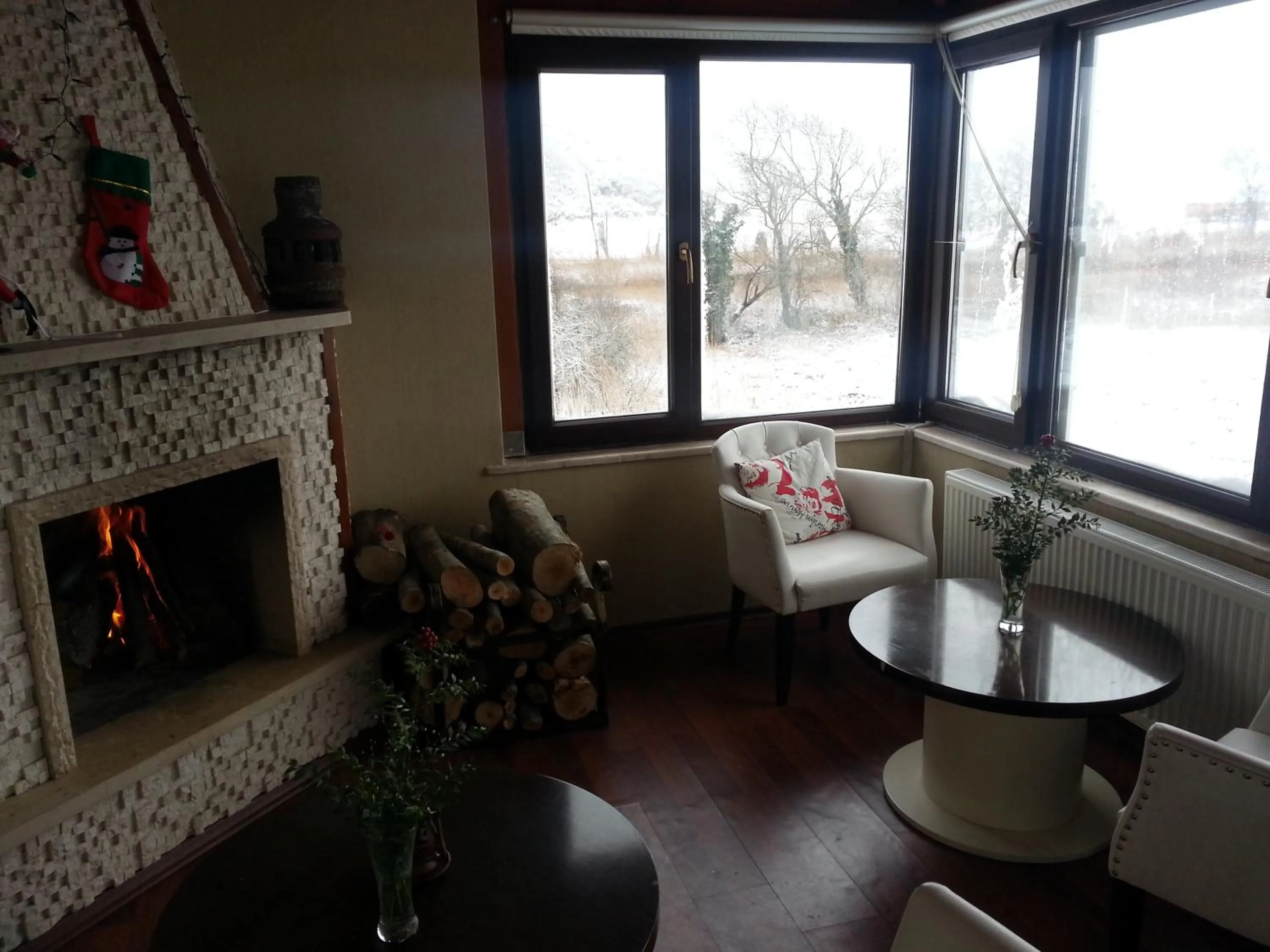 Communal lounge/ TV room in Velena Hotel