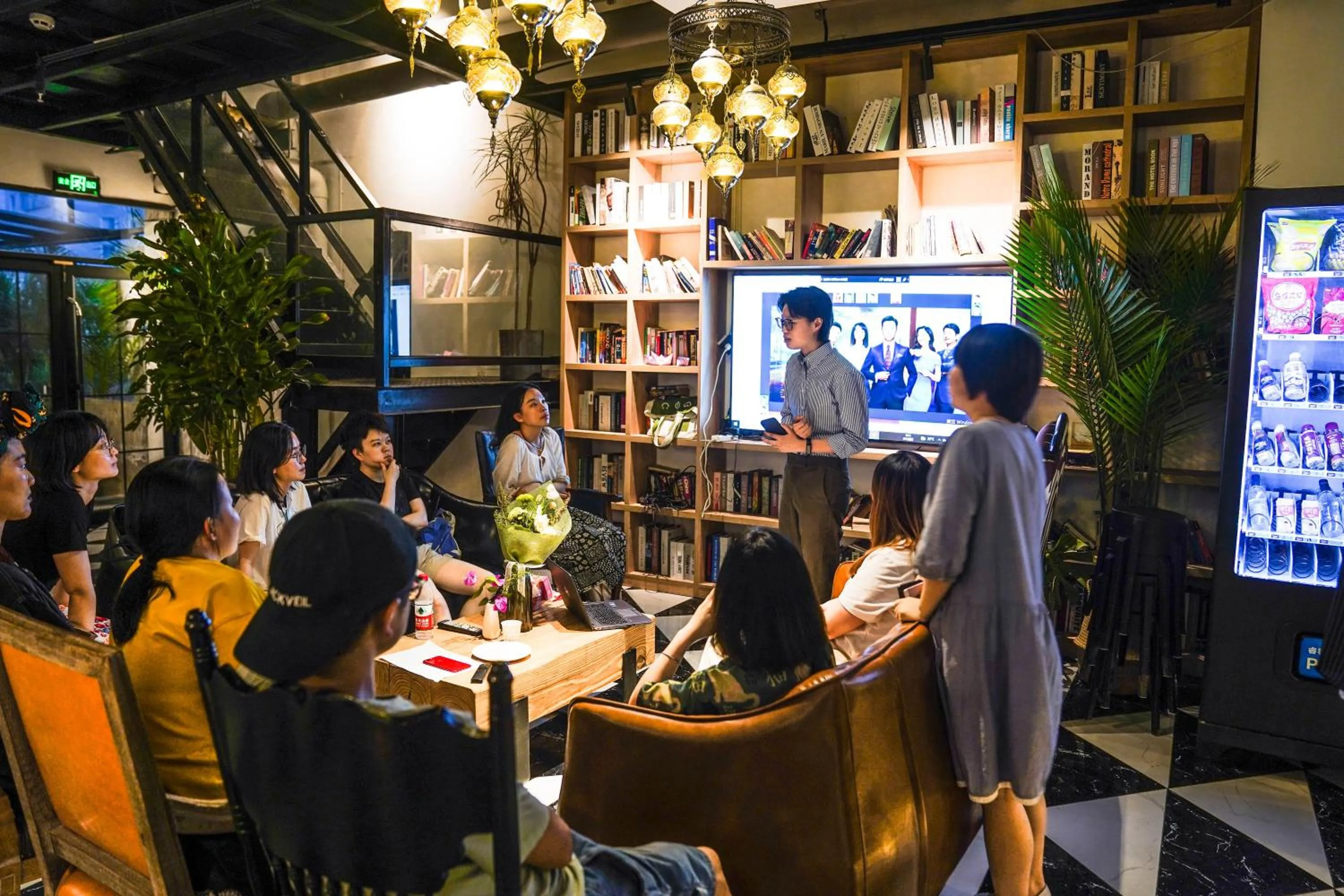 Communal lounge/ TV room in Chengdu Local Tea Hostel - Short Walk To Taikooli - Chill & Social Coffee Lounge - Metro downstairs - Free Activities - Friendly English Speaking Staff - Tibet, Panda, Buddha & Snow Mountain Tours