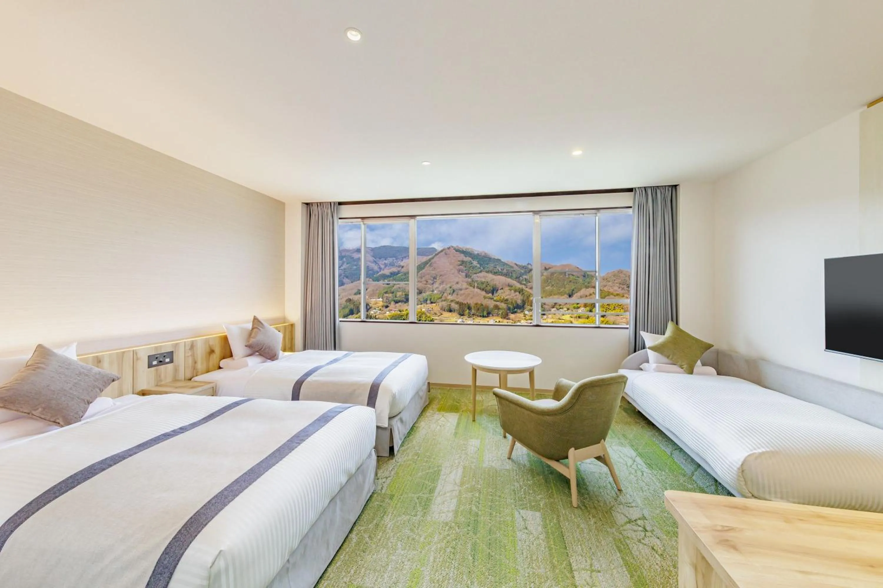 Photo of the whole room, Bed in KAMENOI HOTEL Nagatoro Yorii