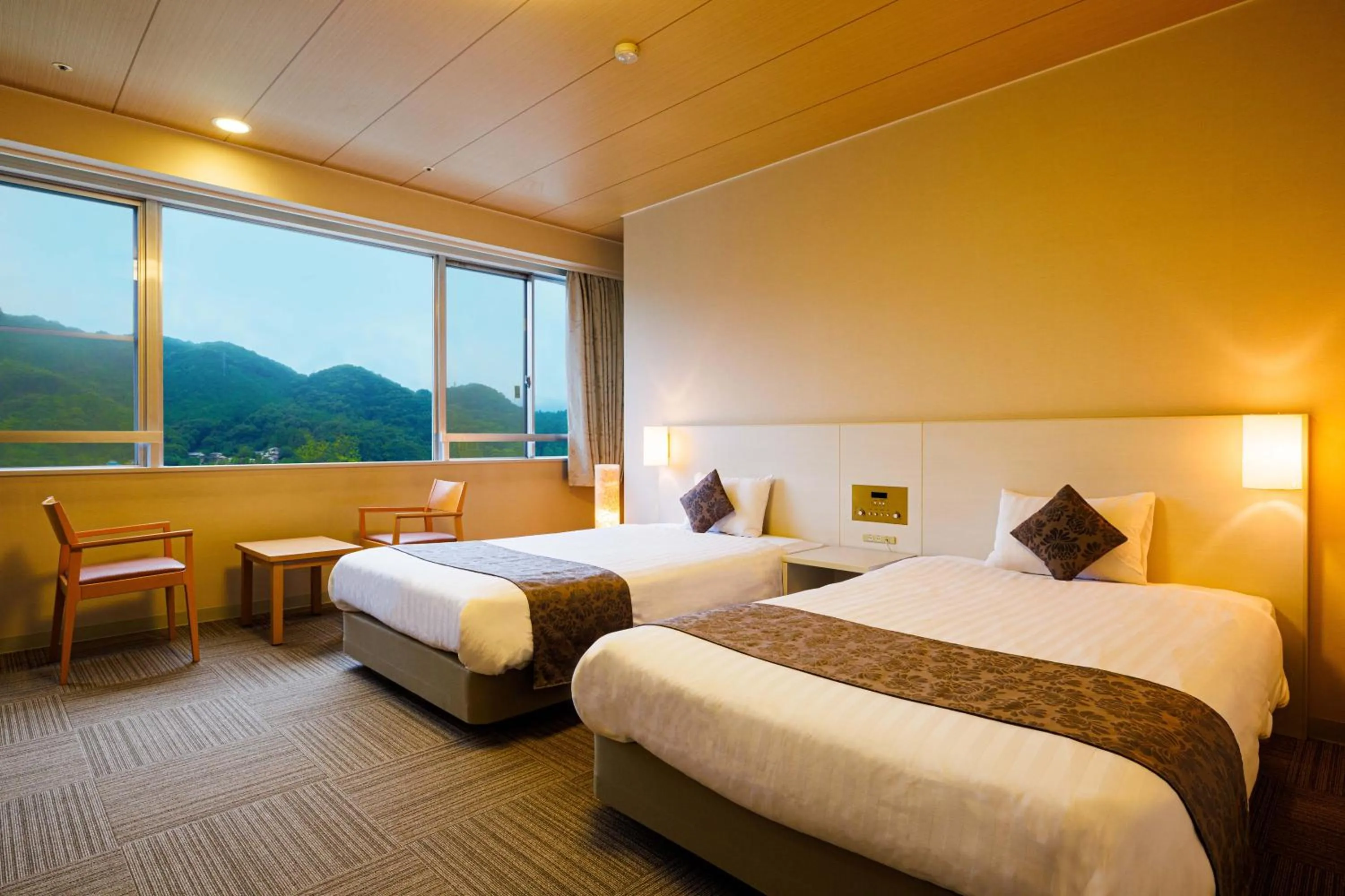 Photo of the whole room, Bed in KAMENOI HOTEL Nagatoro Yorii
