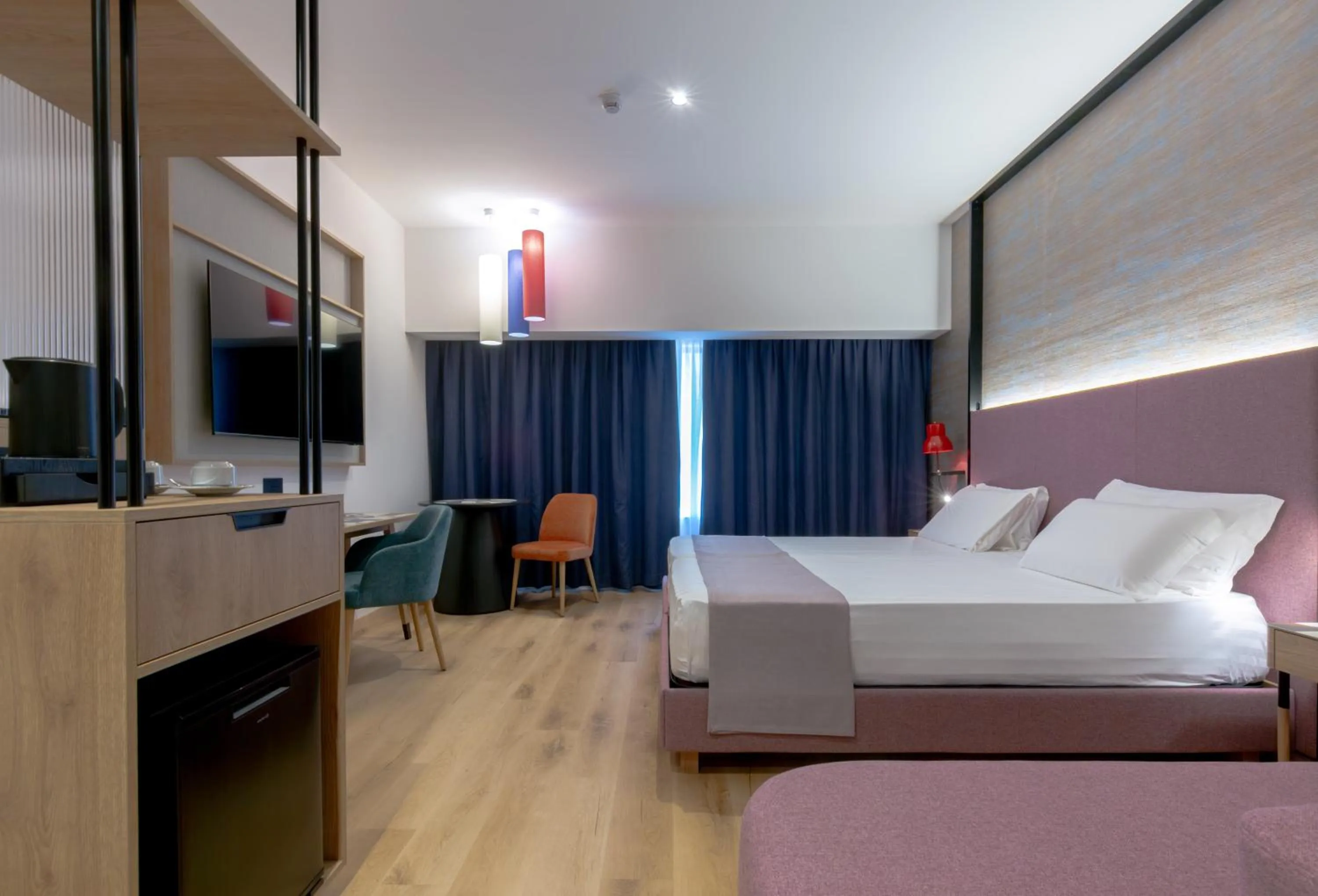 Bed in Hotel Poseidon