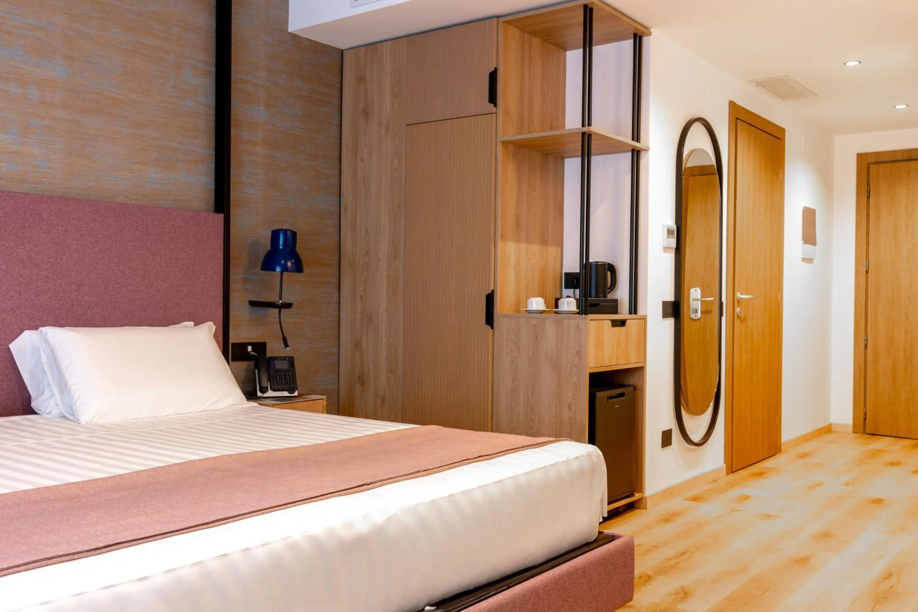 Bed in Hotel Poseidon