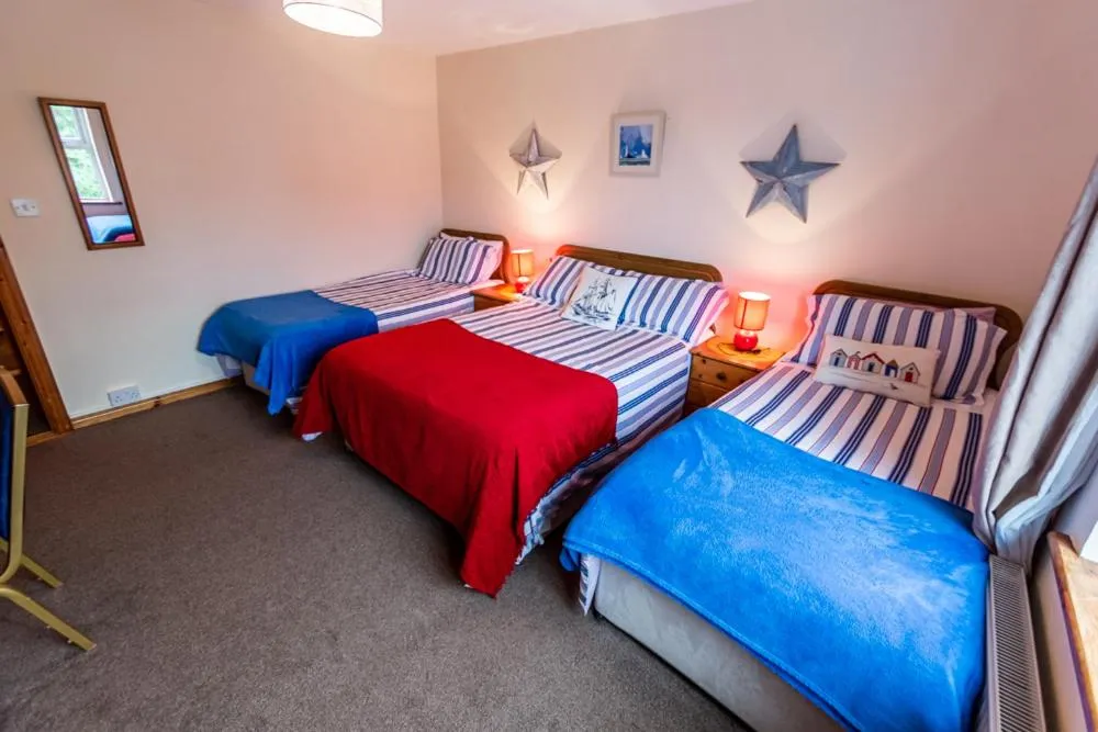 Bed in Seawinds Bed and Breakfast