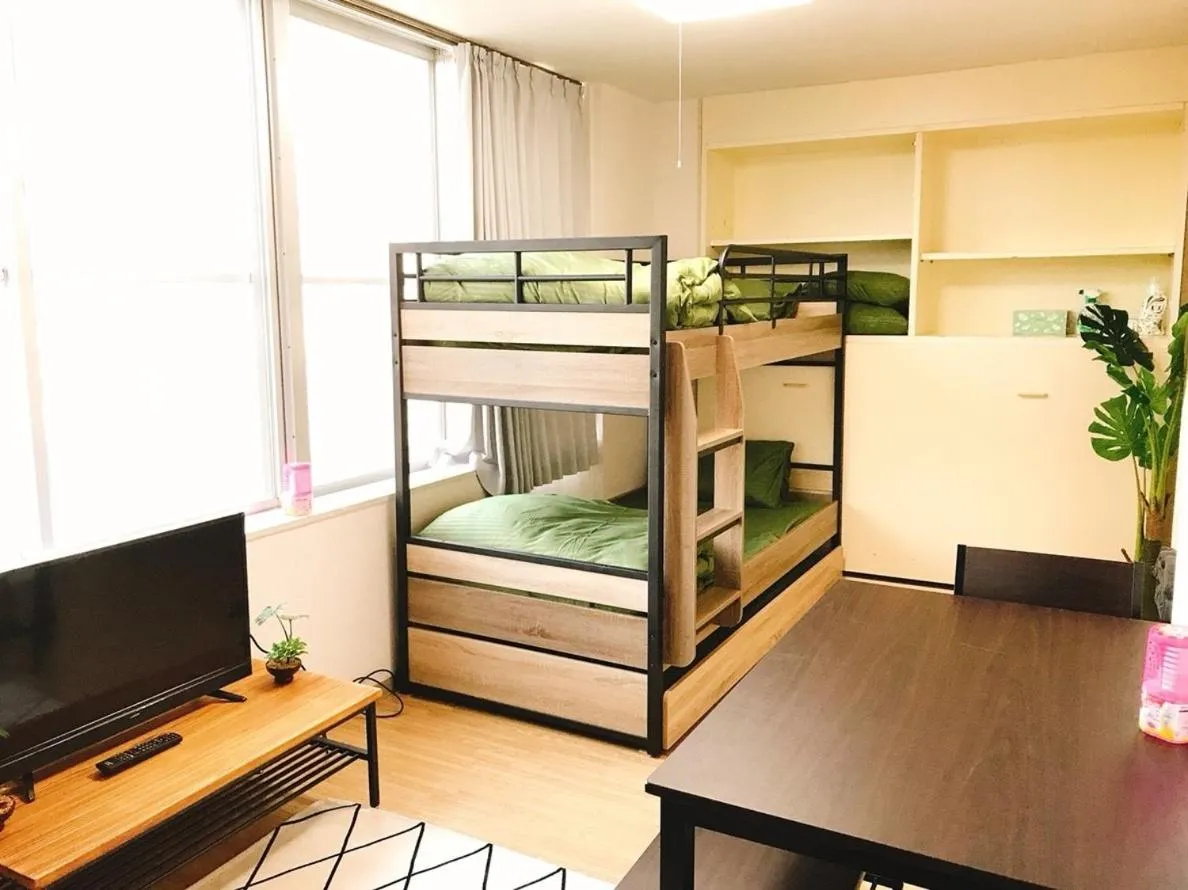 Bed in Joinus Ise Apartment by Tranova