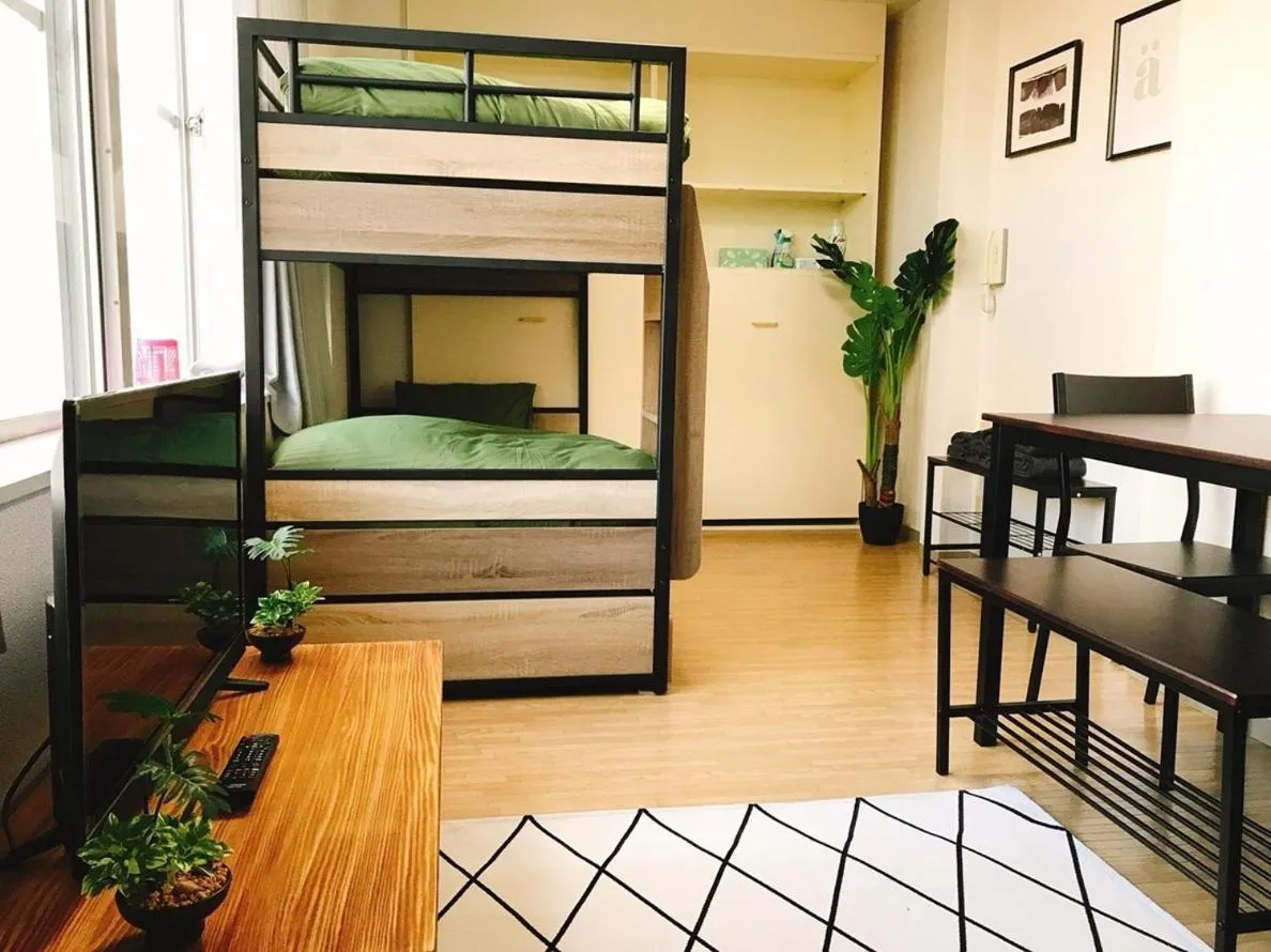 Bed in Joinus Ise Apartment by Tranova