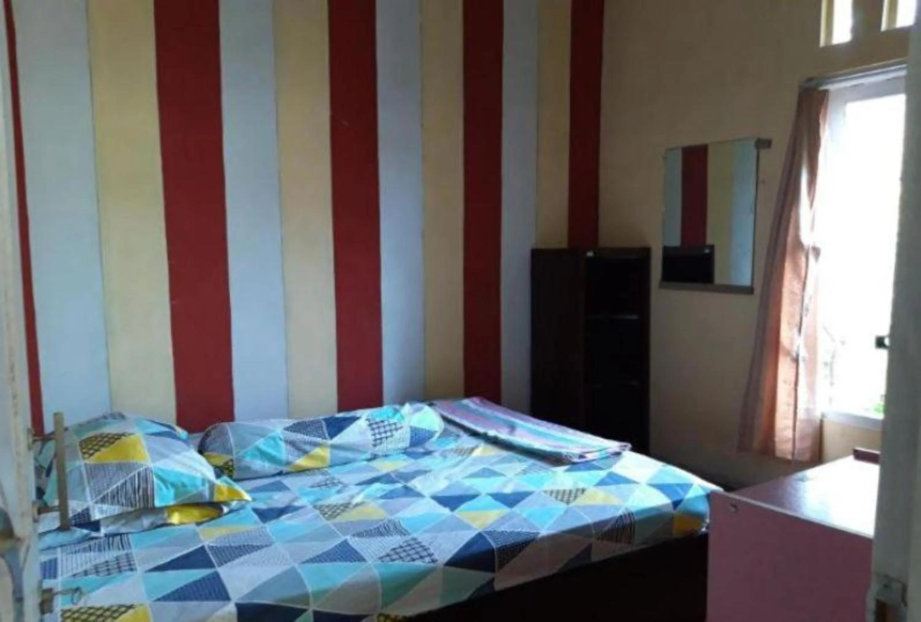 Photo of the whole room, Bed in Toto Homestay