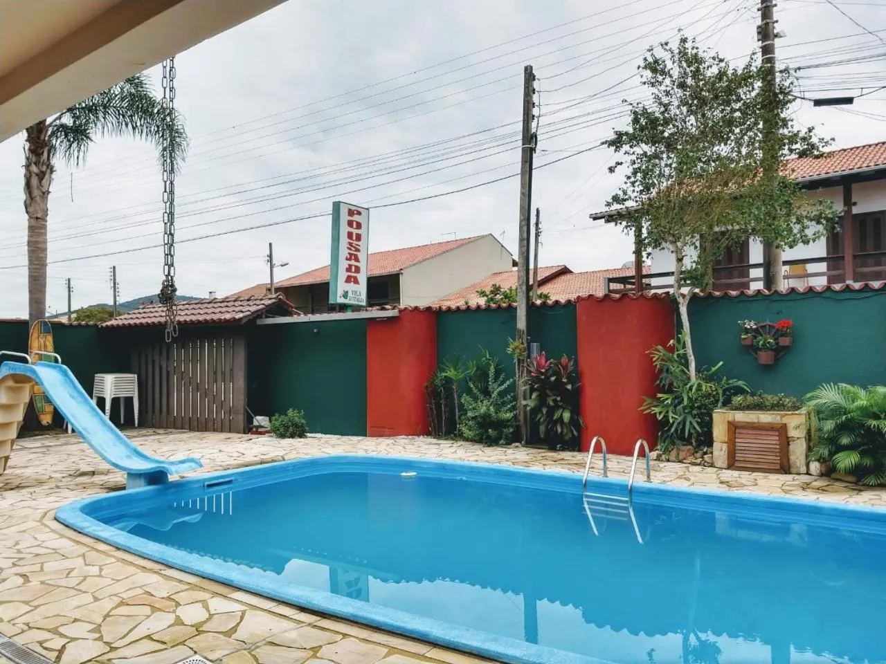 Swimming pool in Pousada Vila D' Itália