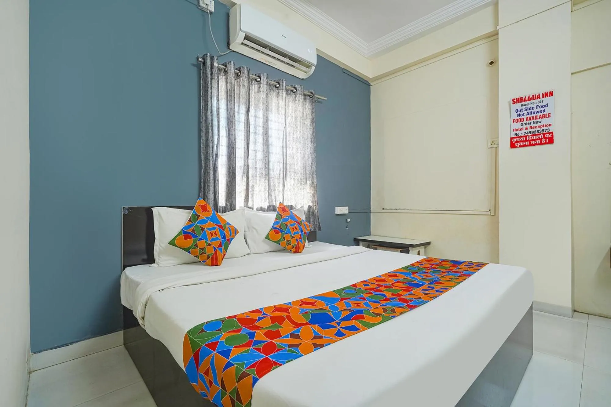 Bed in FabExpress Shraddha inn