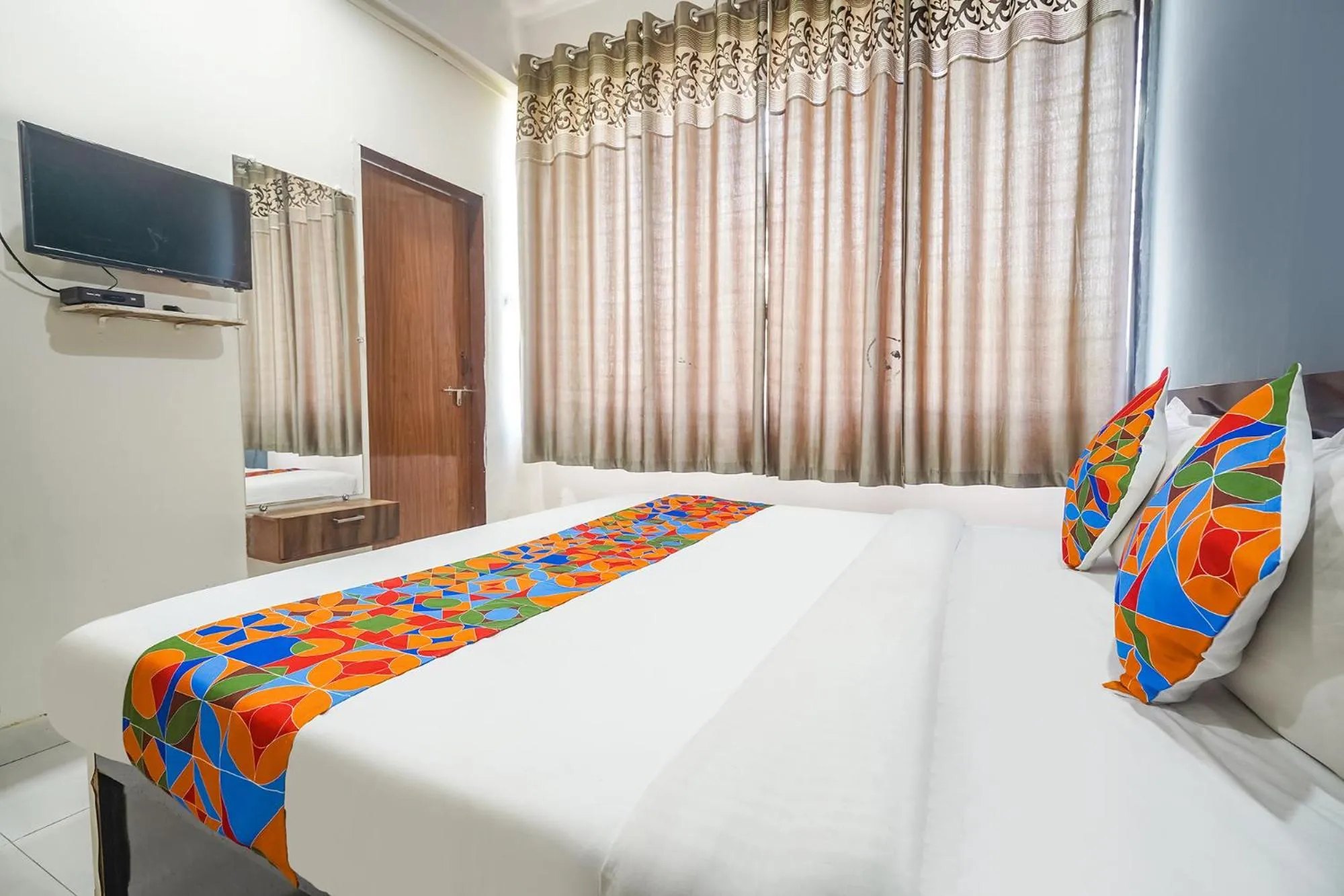 Bed in FabExpress Shraddha inn