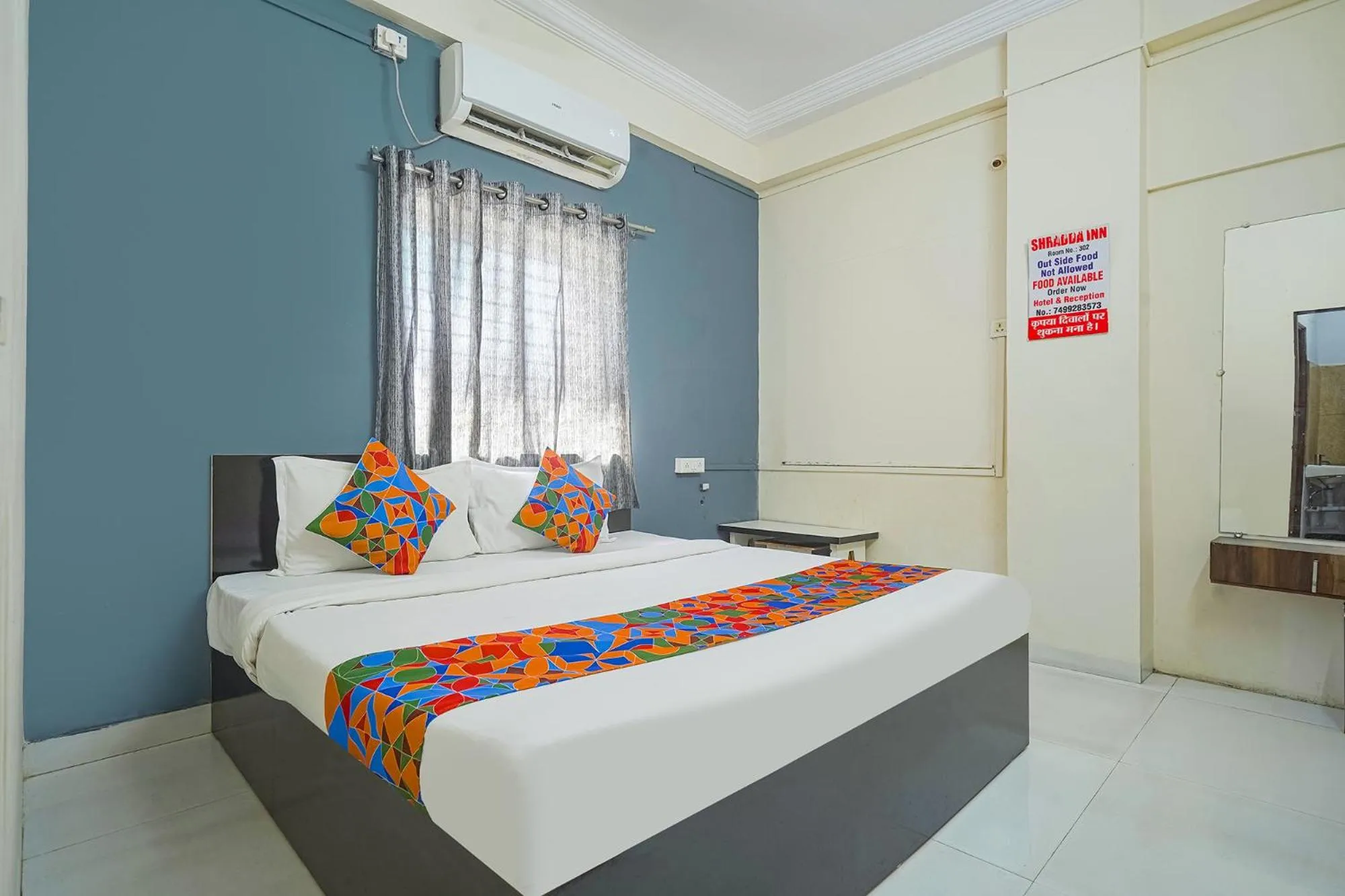 Bed in FabExpress Shraddha inn