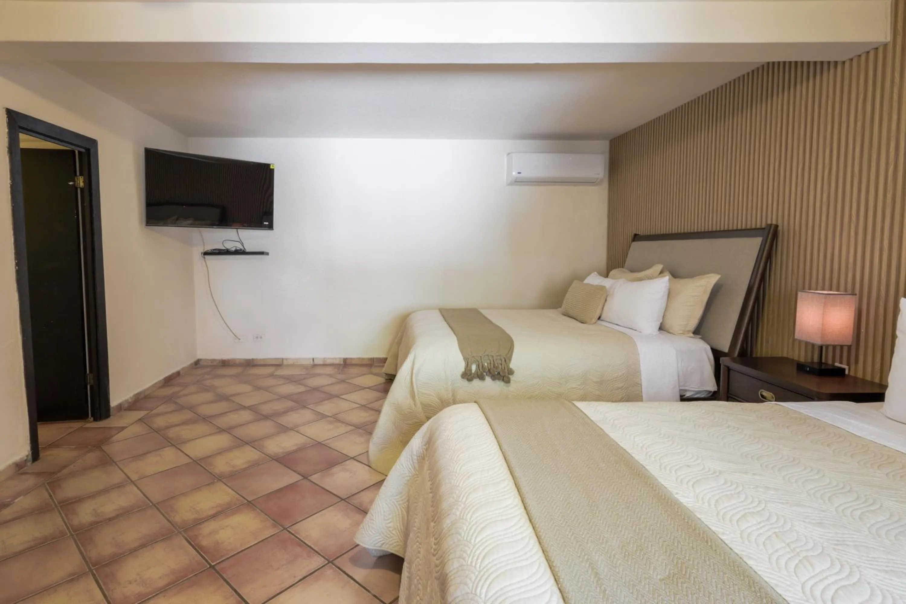 Bed in Hotel Posada Terranova