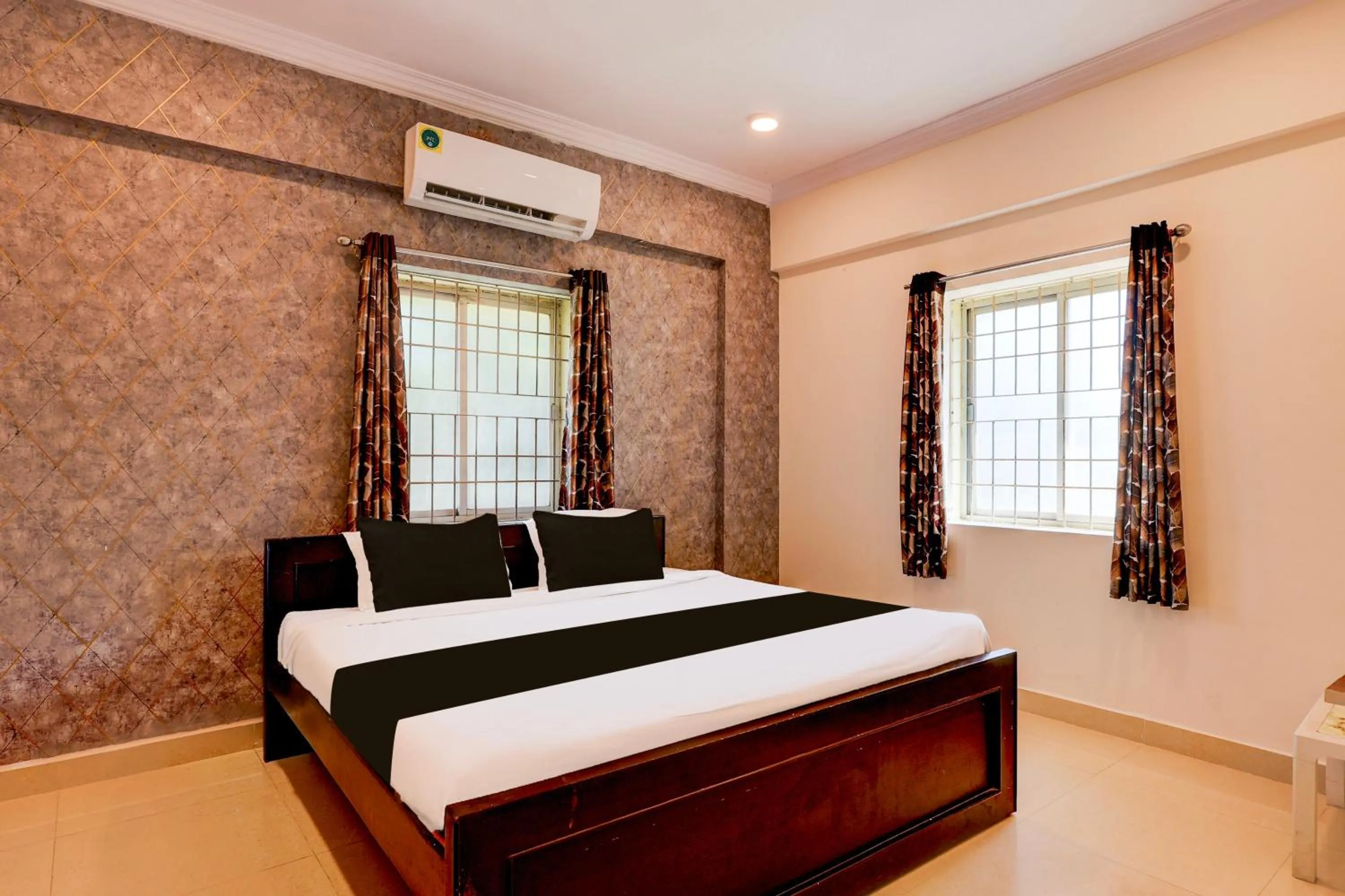 Bedroom, Bed in Super Hotel O Rushikonda Beach