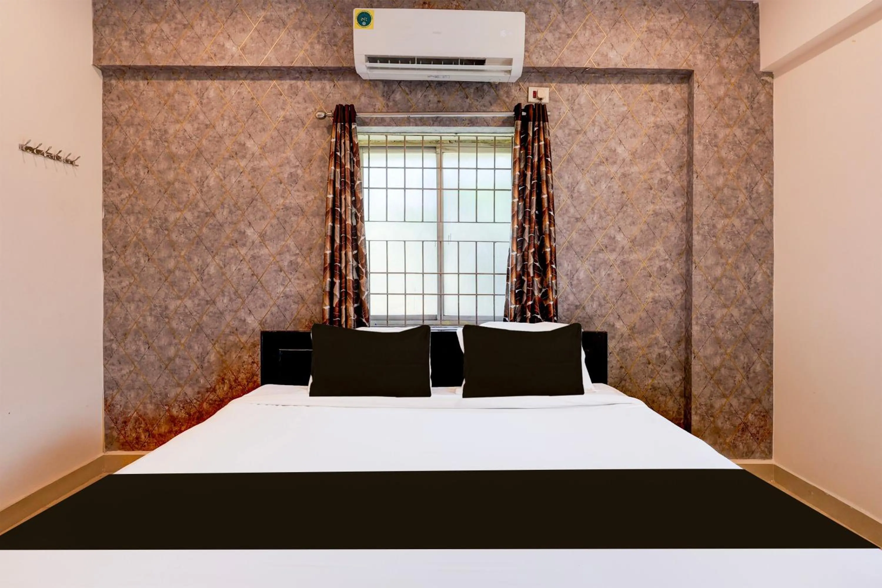 Bedroom, Bed in Super Hotel O Rushikonda Beach