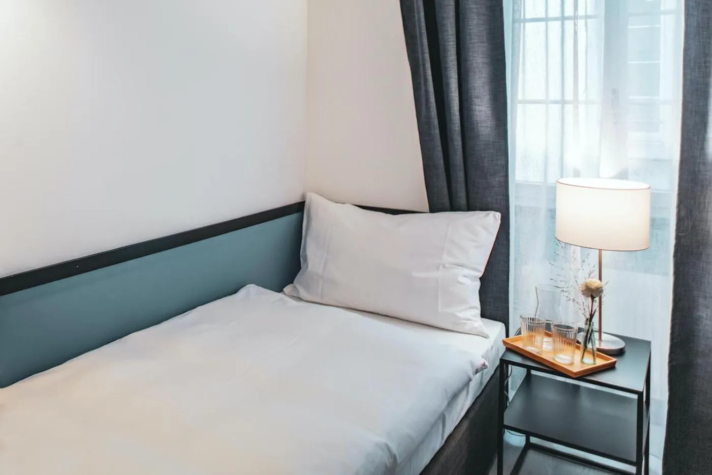 Photo of the whole room, Bed in Pop Up Hotel Krone Zürich