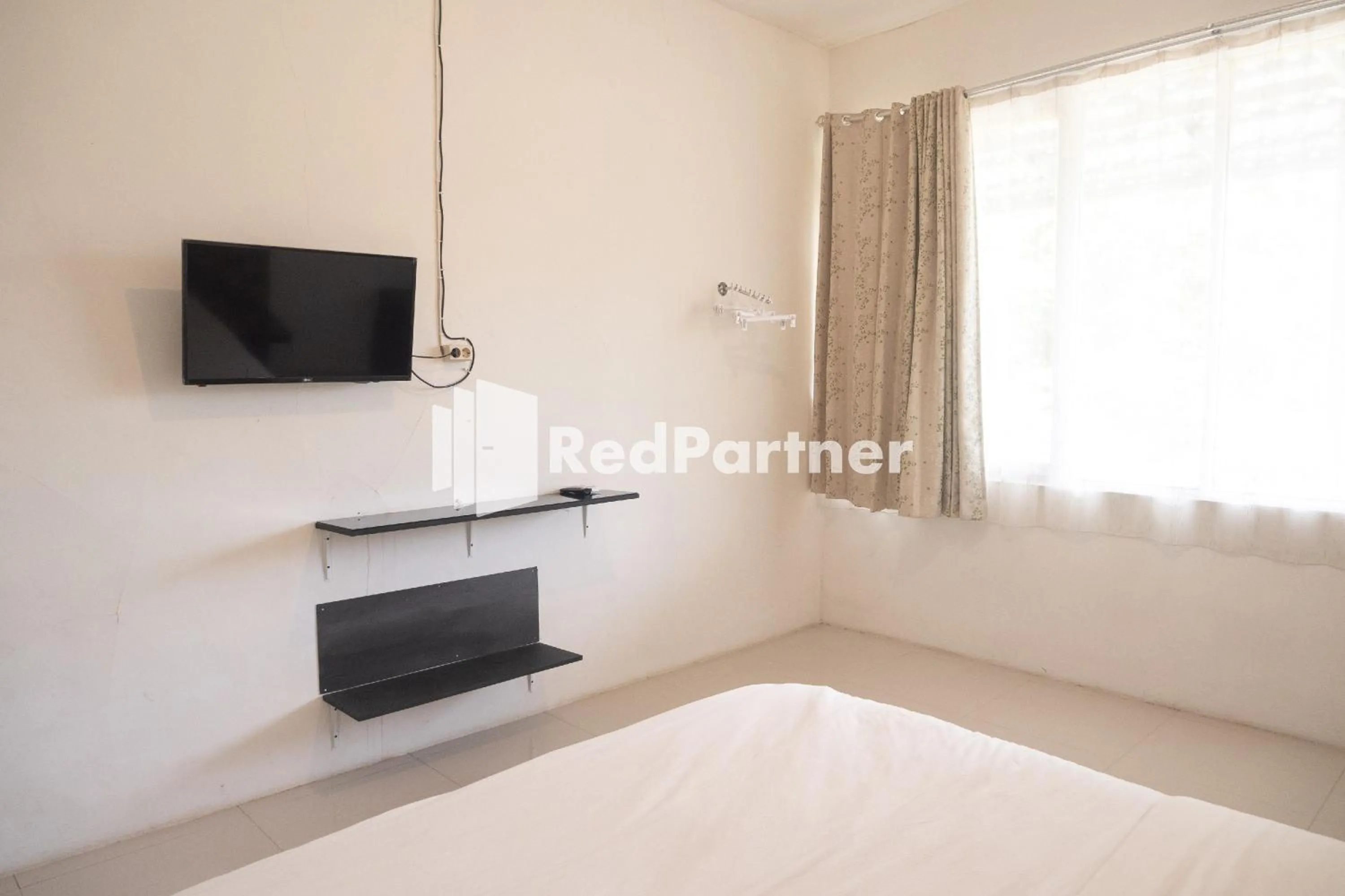 Bedroom, Bed in Homestay C9 Exclusive Kaliurang Yogyakarta Mitra RedDoorz