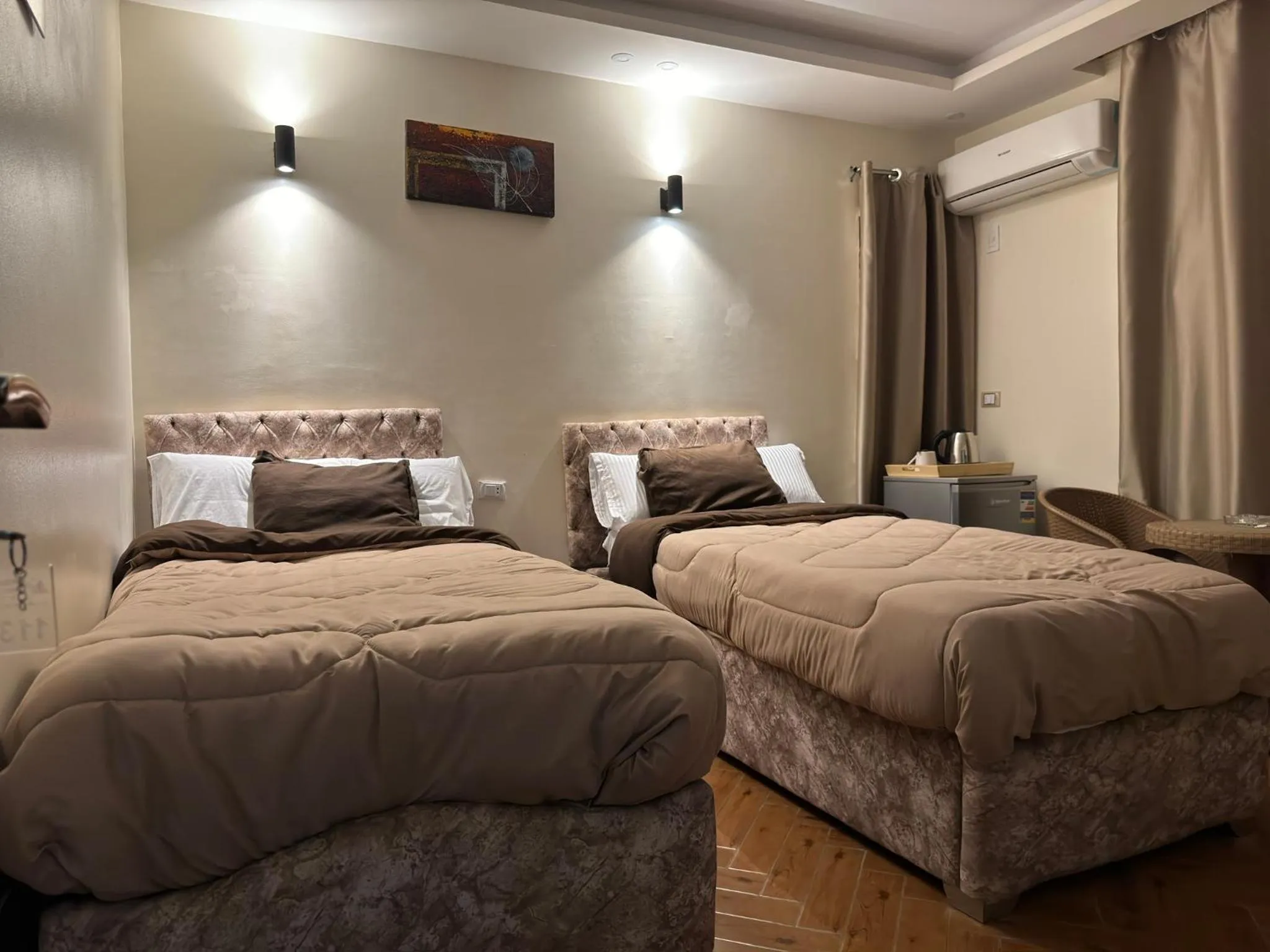 Bed in Pyramids Gardens Hotel