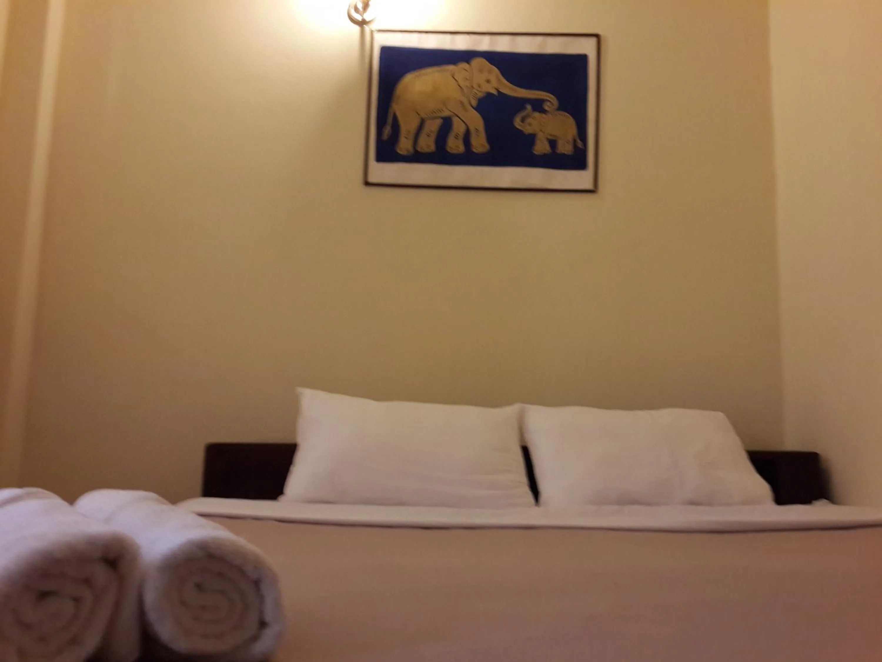 Bed in A Tee Guesthouse