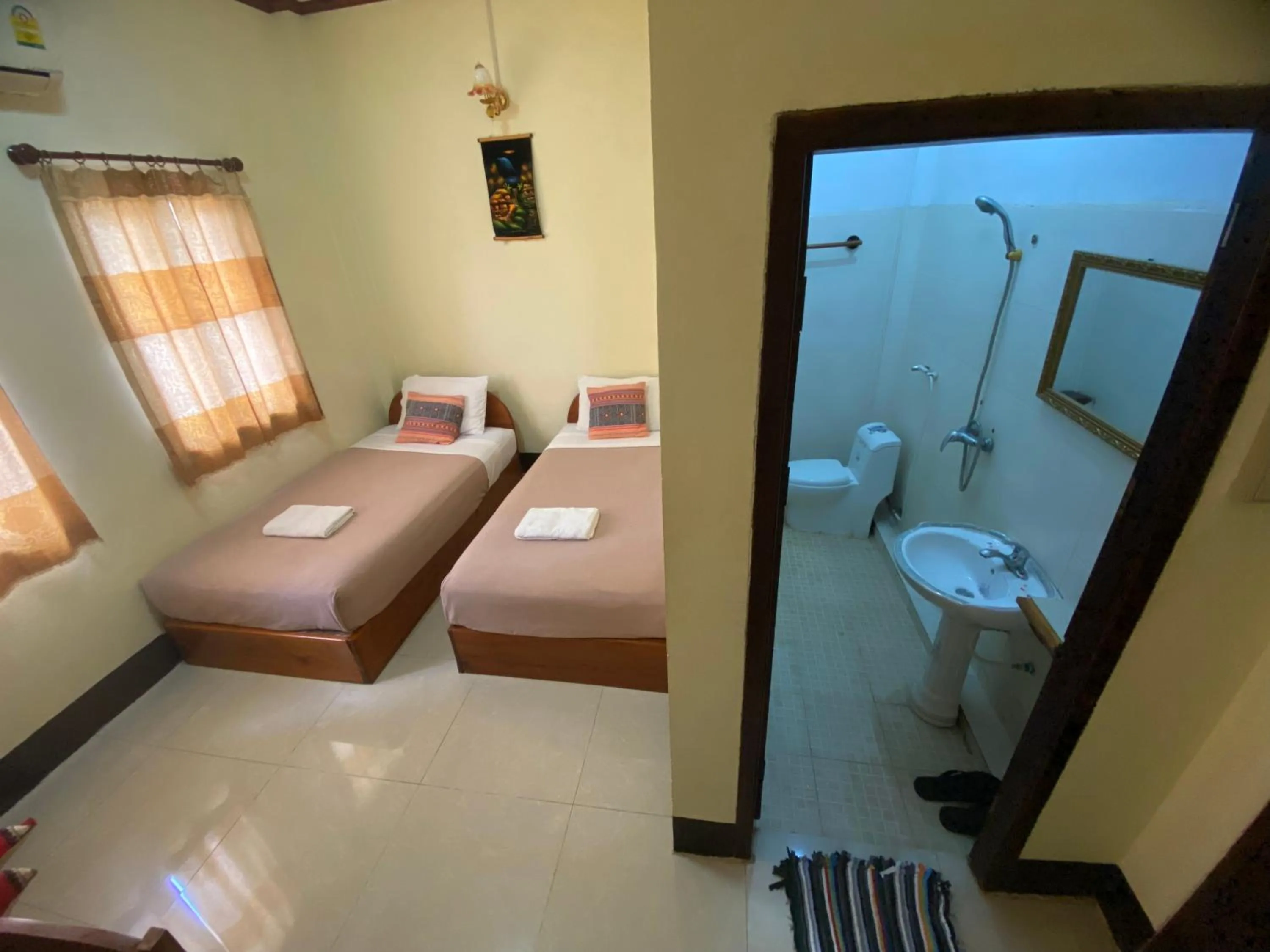 Bedroom, Bed in A Tee Guesthouse