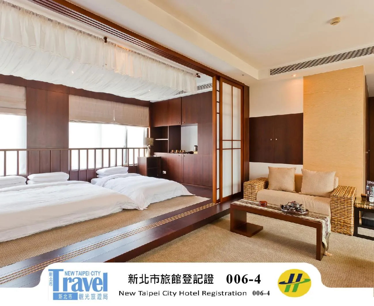 Bed in The Loft Seaside Suites