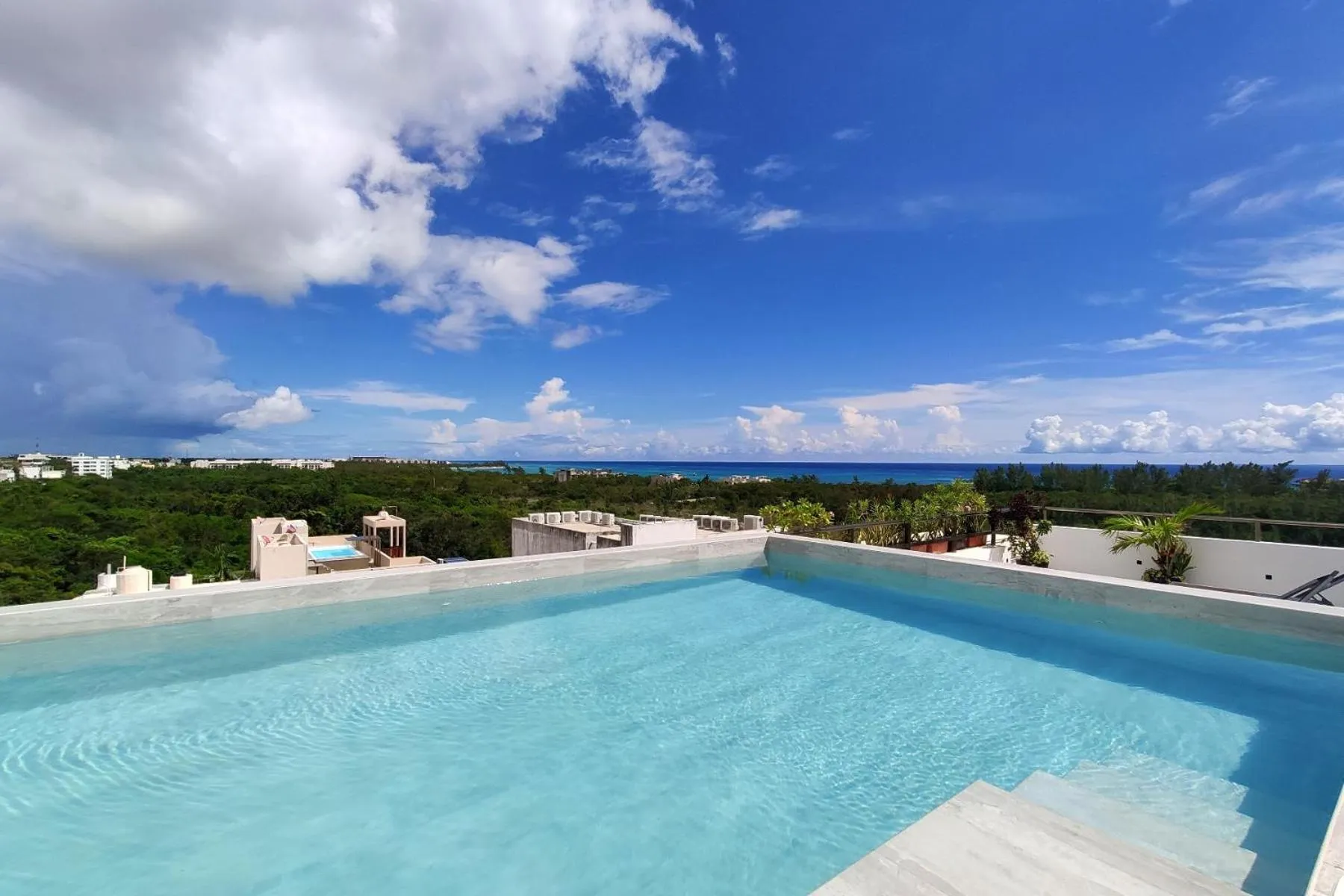 Swimming pool in MAYAN MONK Suites