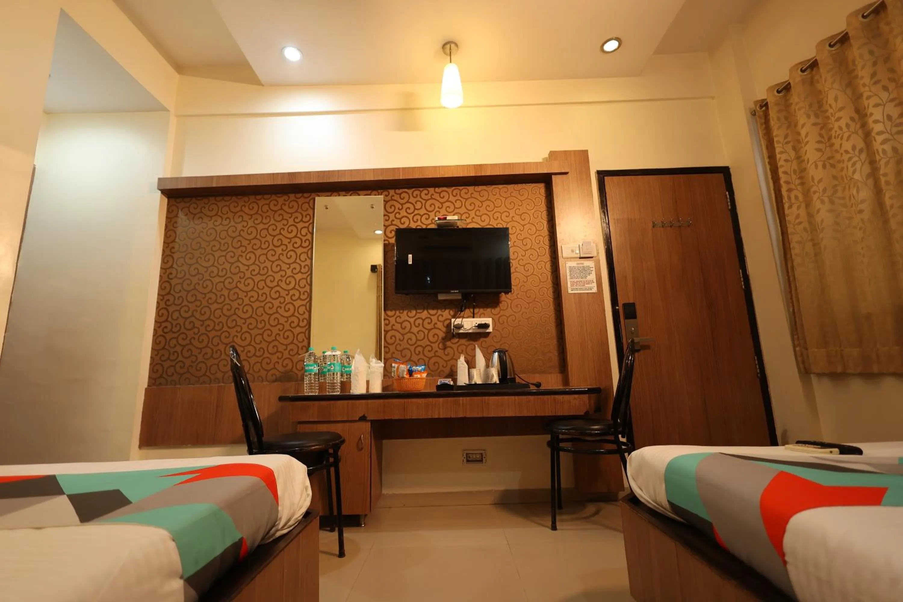 Bed in Hotel Sai Grand Castle Inn