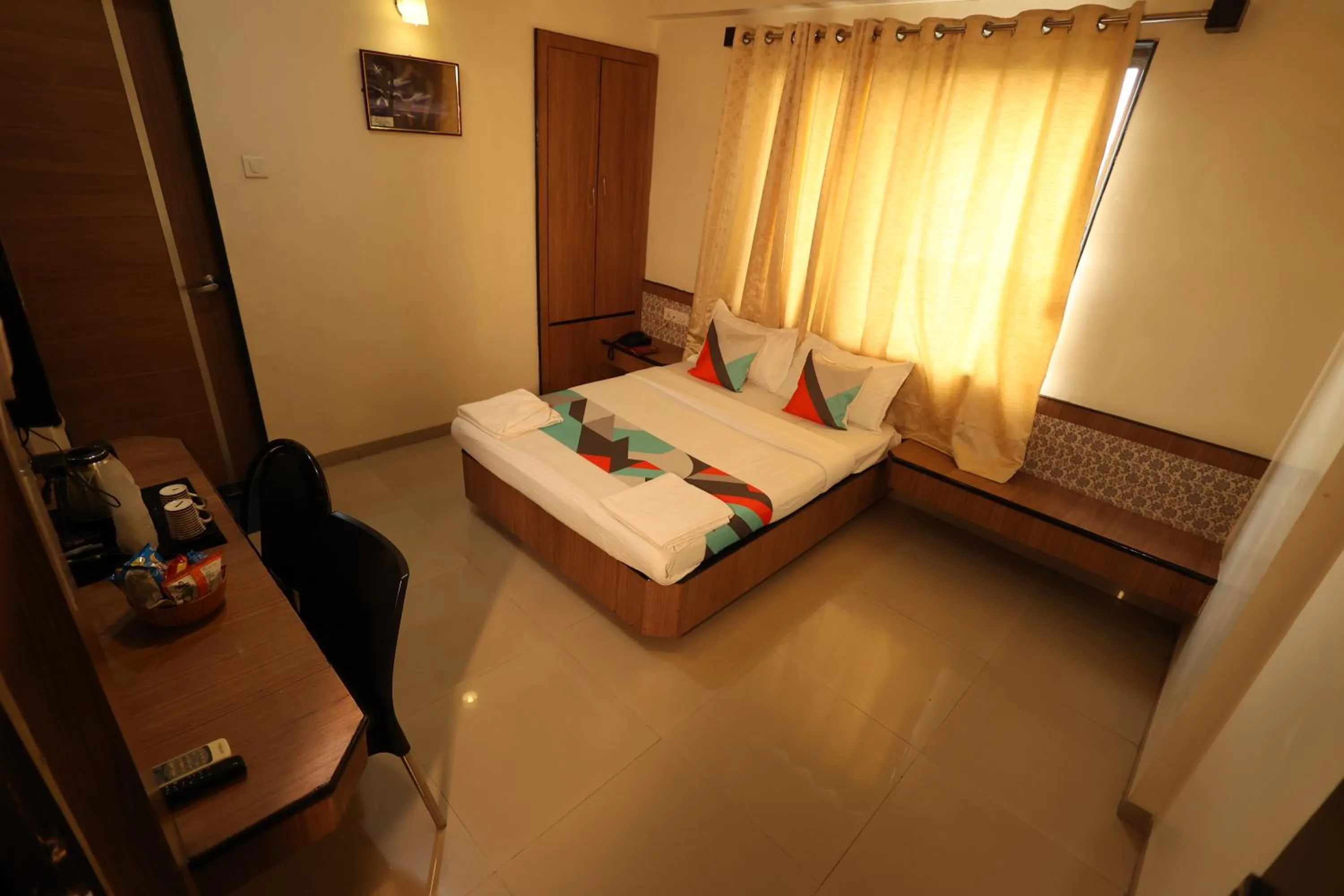 Bed in Hotel Sai Grand Castle Inn