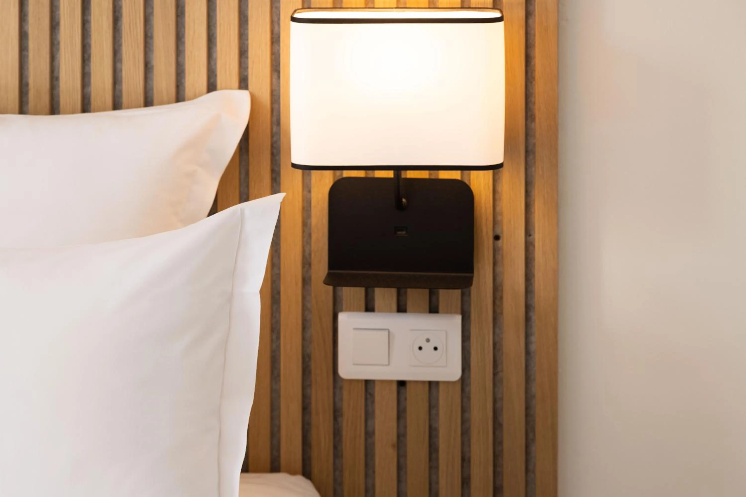 Bed in Hotel Korner Montparnasse