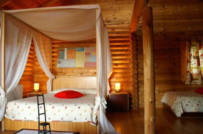 Bed in Dionysus Village Resort