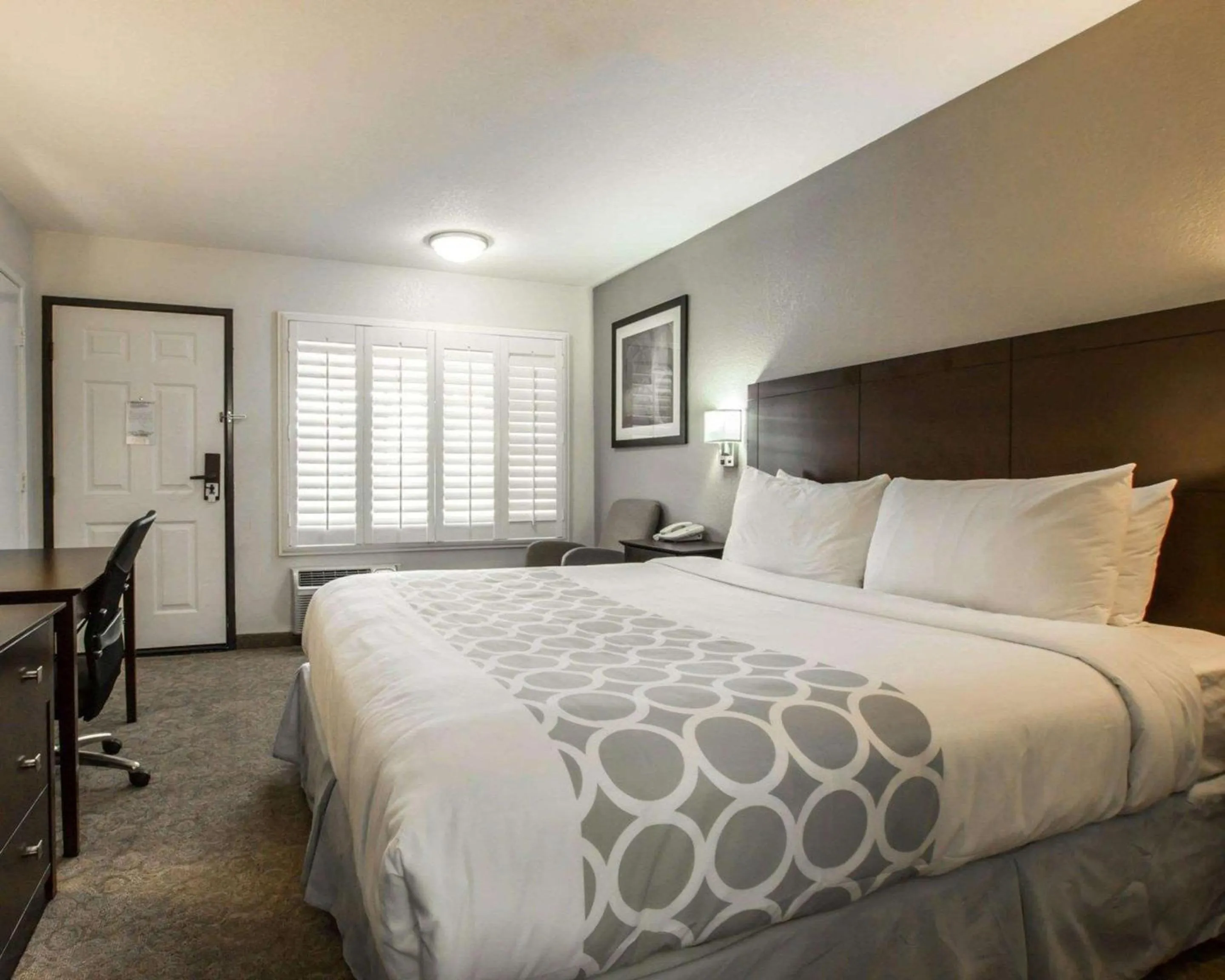 Photo of the whole room, Bed in Rodeway Inn Convention Center