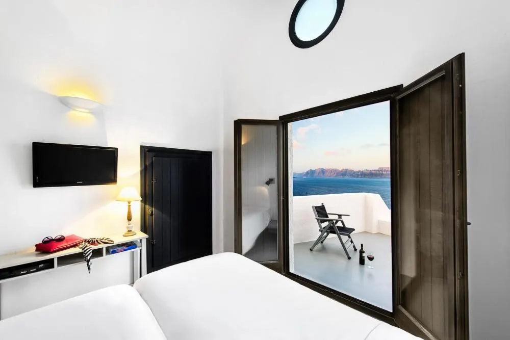 Photo of the whole room, Bed in Grand Ambassador Santorini Hotel