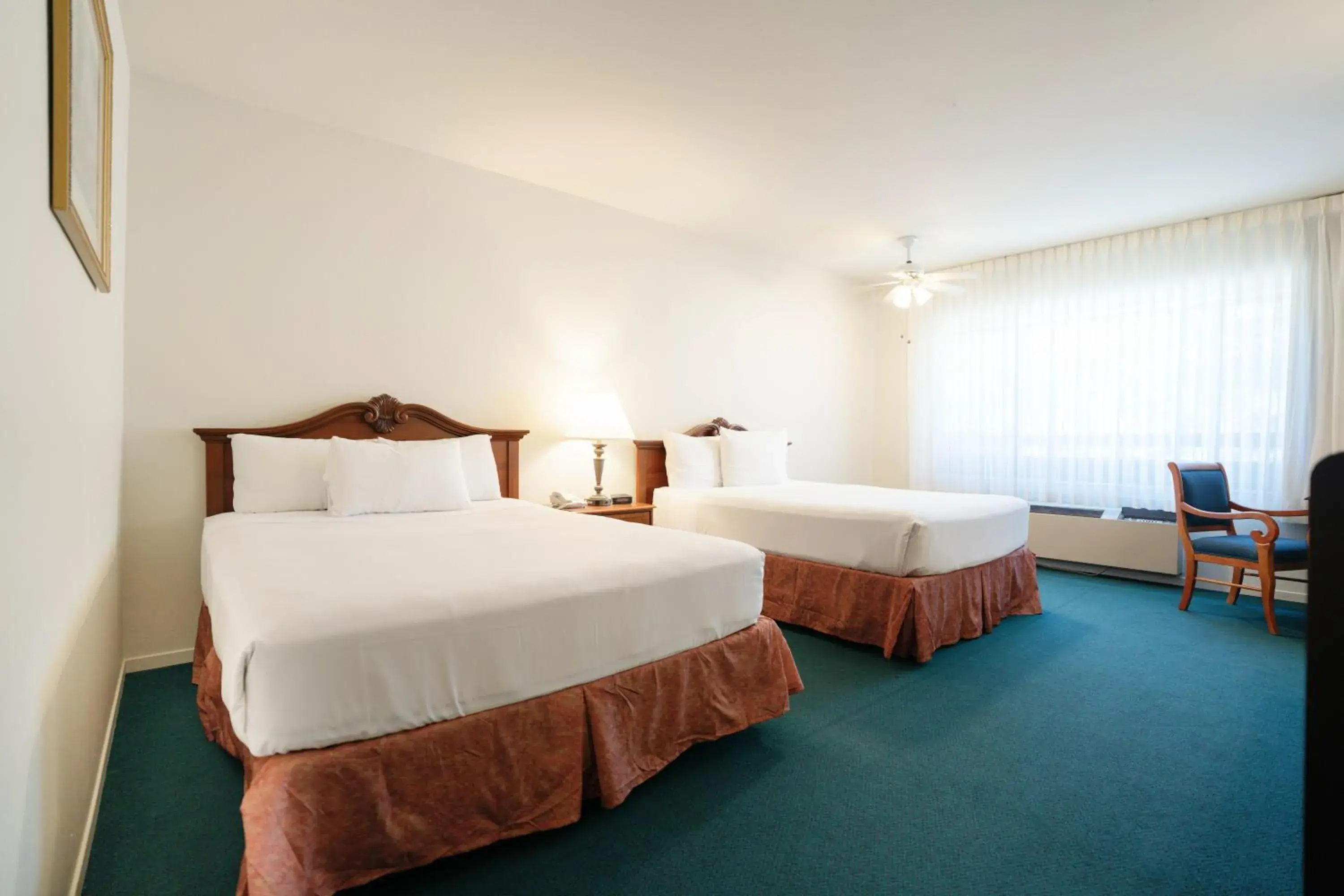 Queen Room with Two Queen Beds in The Monarch Resort Queen Room with Two Queen Beds in The Monarch Resort