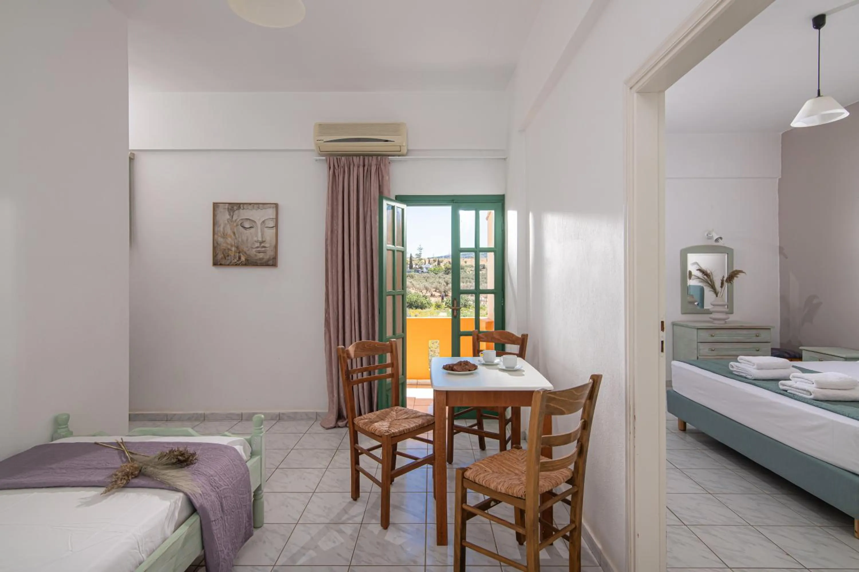 Bed in Portokali Apartments