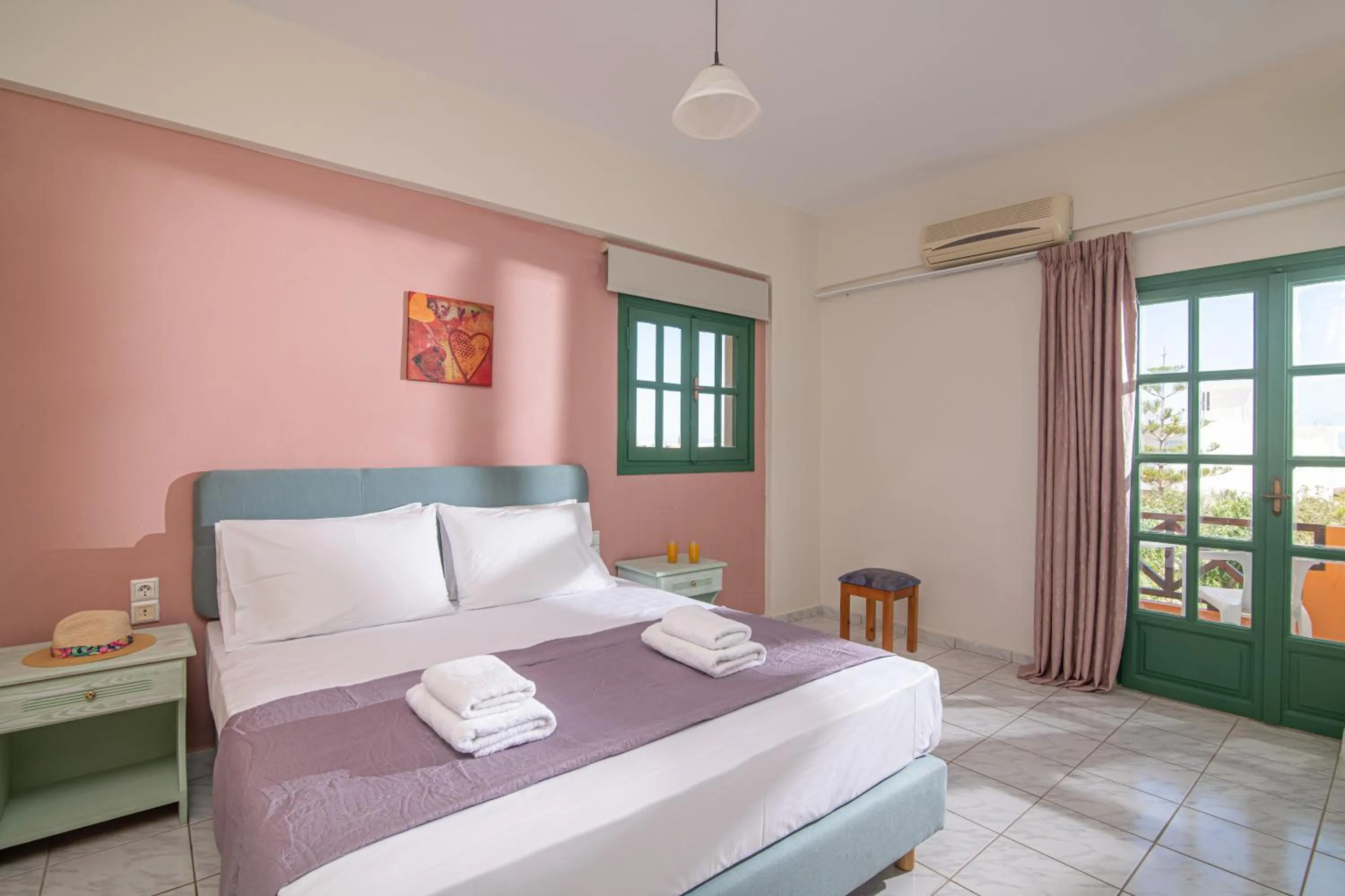 Bed in Portokali Apartments