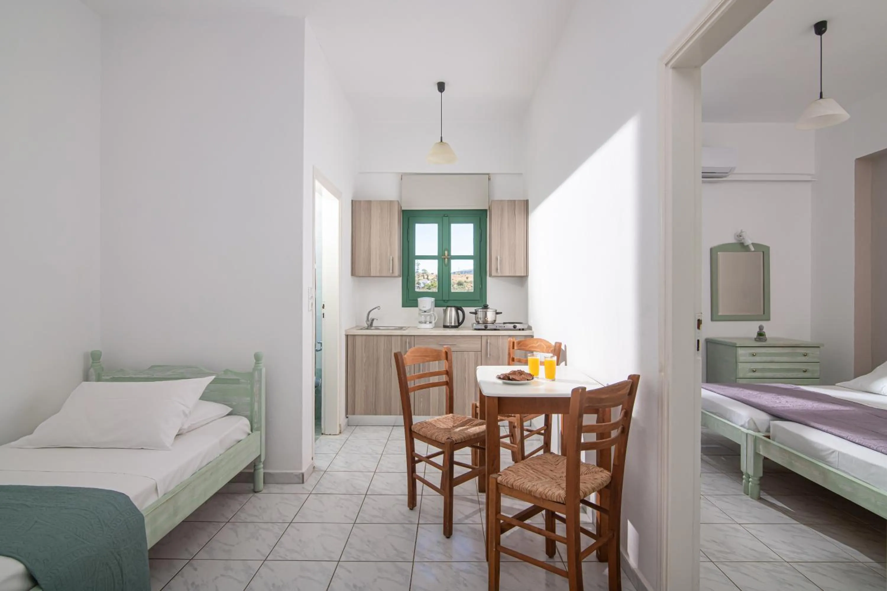 Bed in Portokali Apartments